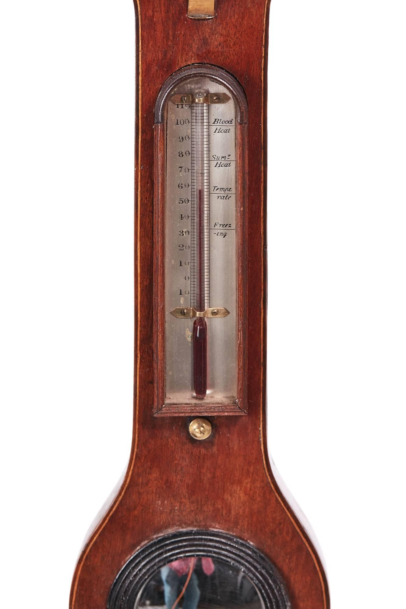 Georgian mahogany banjo barometer, with a swan neck pediment, satinwood stringing to the case, thermometer, small round mirror and a silver 9