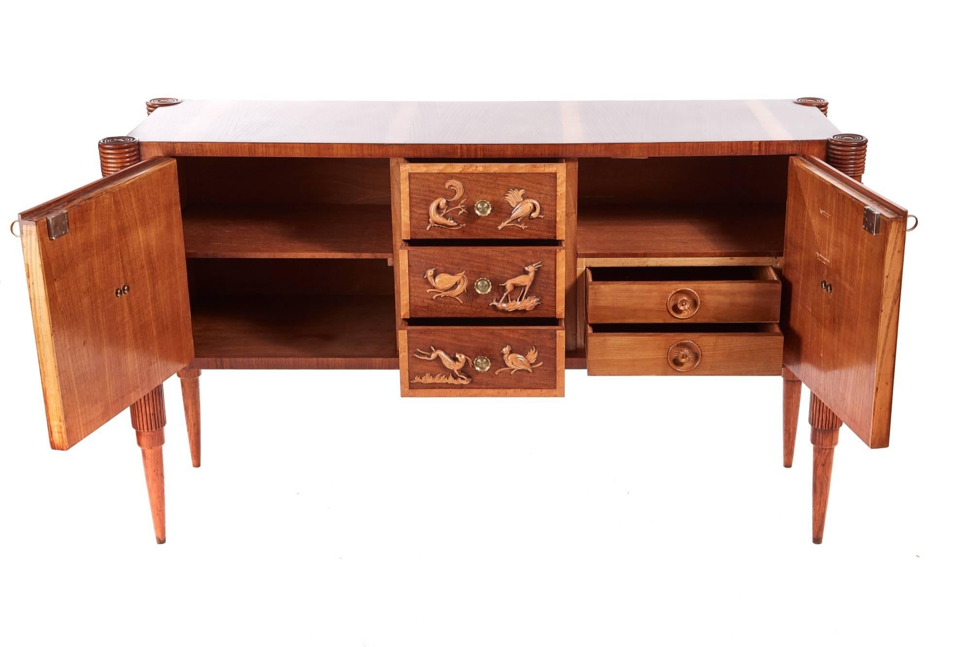Fantastic Pier Luigi Colli bird's-eye maple sideboard, with a lovely ash top crossbanded in bird's-eye maple turned rings to the corners, two bird's-eye maple veneer doors, three centre drawers, with unusual quality carvings of birds, deer, hare and
