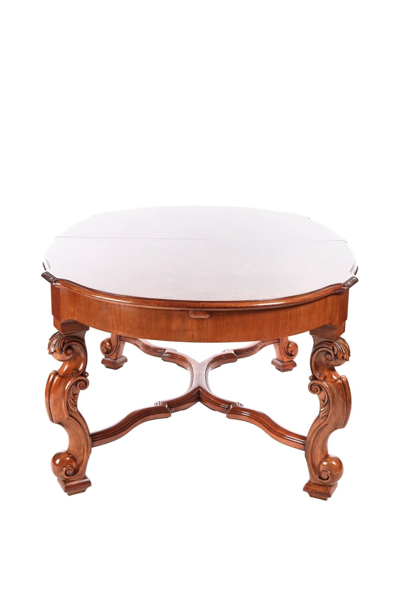 Outstanding antique burr walnut dining table, with a fantastic burr walnut top and two extra leaves carved edge, shaped frieze, standing on four fantastic solid walnut carved shaped cabriole legs, united by a solid walnut shaped stretcher,
Fantastic