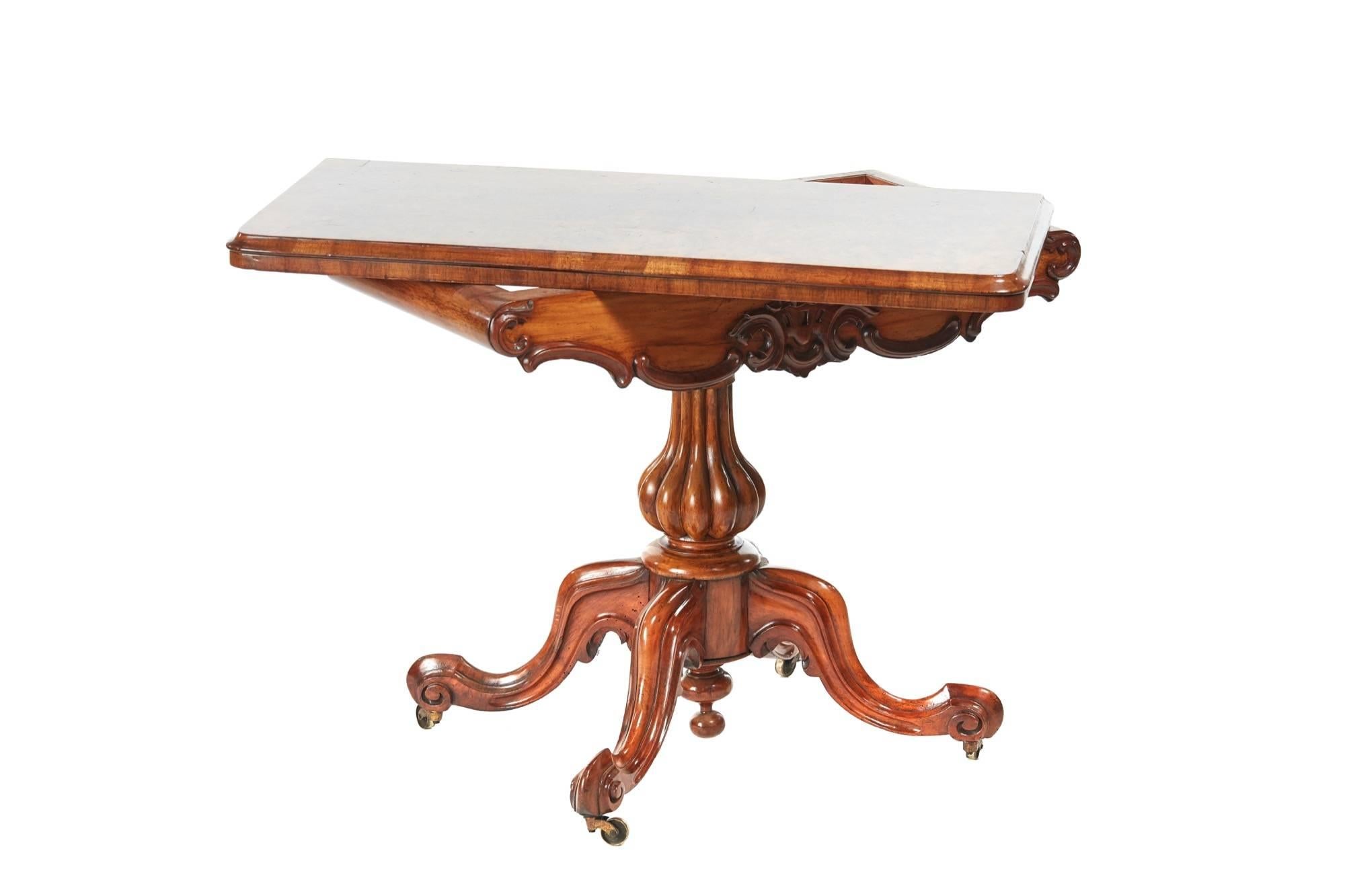 Fine quality Victorian burr walnut tea table, with a fantastic burr walnut swivel top opening to reveal a fantastic burr walnut interior, serpentine carved frieze, shaped receded column supported by four carved shaped cabriole legs on original