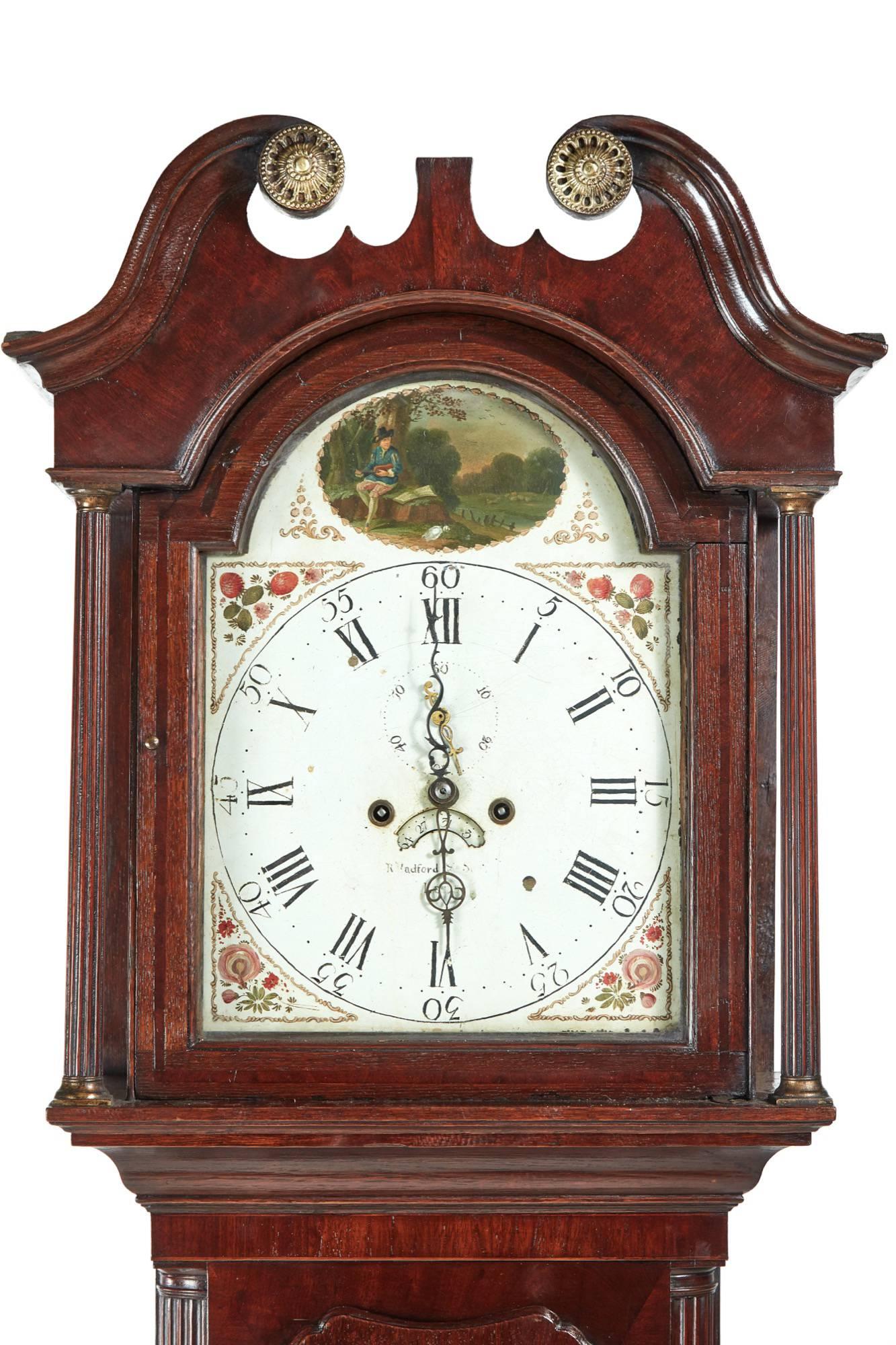 George III oak and mahogany 8 day grandfather clock, with a swan-neck pediment, lovely decorative arched painted dial with date and seconds dial,8 day duration mechanism striking the hour on the bell, lovely oak and mahogany case with a shaped door