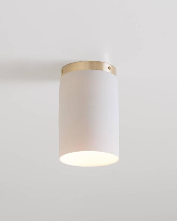 Surface, A Flush Mount Ceiling Light in White Porcelain and Brushed Brass For Sale 2