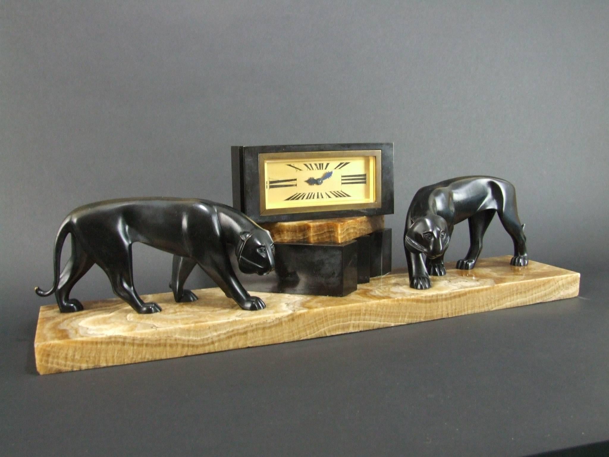Art Deco Bronze, Onyx and Marble Clock by Lavroff