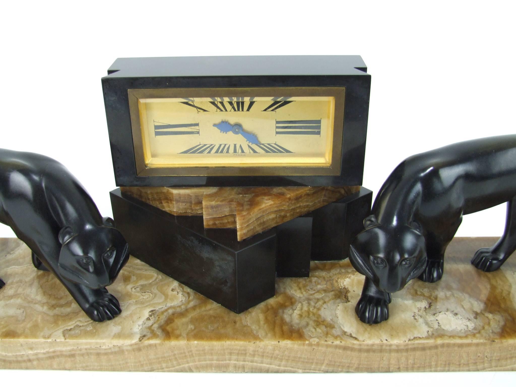 Mid-20th Century Bronze, Onyx and Marble Clock by Lavroff