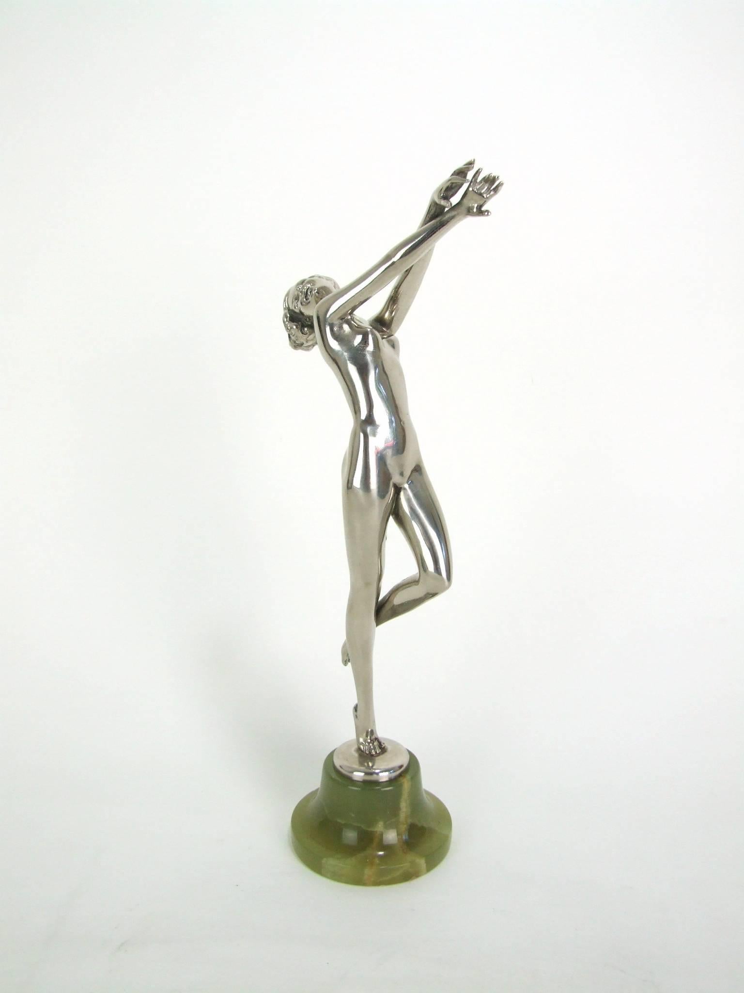 Austrian Art Deco silvered bronze dancer by Joseph Lorenzl. Mounted on an onyx base, she measures a total height of 12.5 inches (31.5cm). Condition is very good. Signed to the socle.
Email me for more pics and your personal shipping quote.