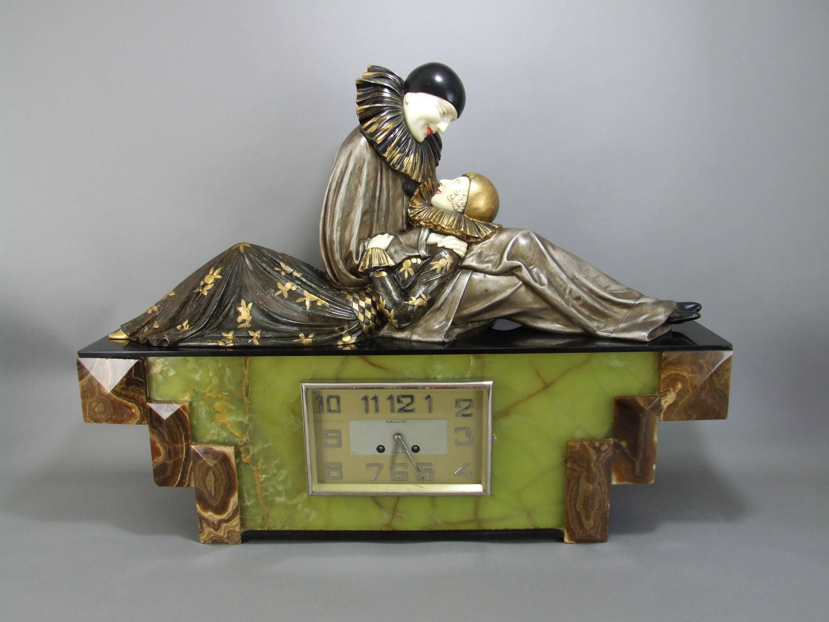 Rare large Art Deco clock set by Demetre Chiparus. Its title is Eternal Story and it is rare as a statue but I have never seen it before as a clock. It is unsigned although the clock face has a title of Gallice and Toulon. Cold painted spelter and