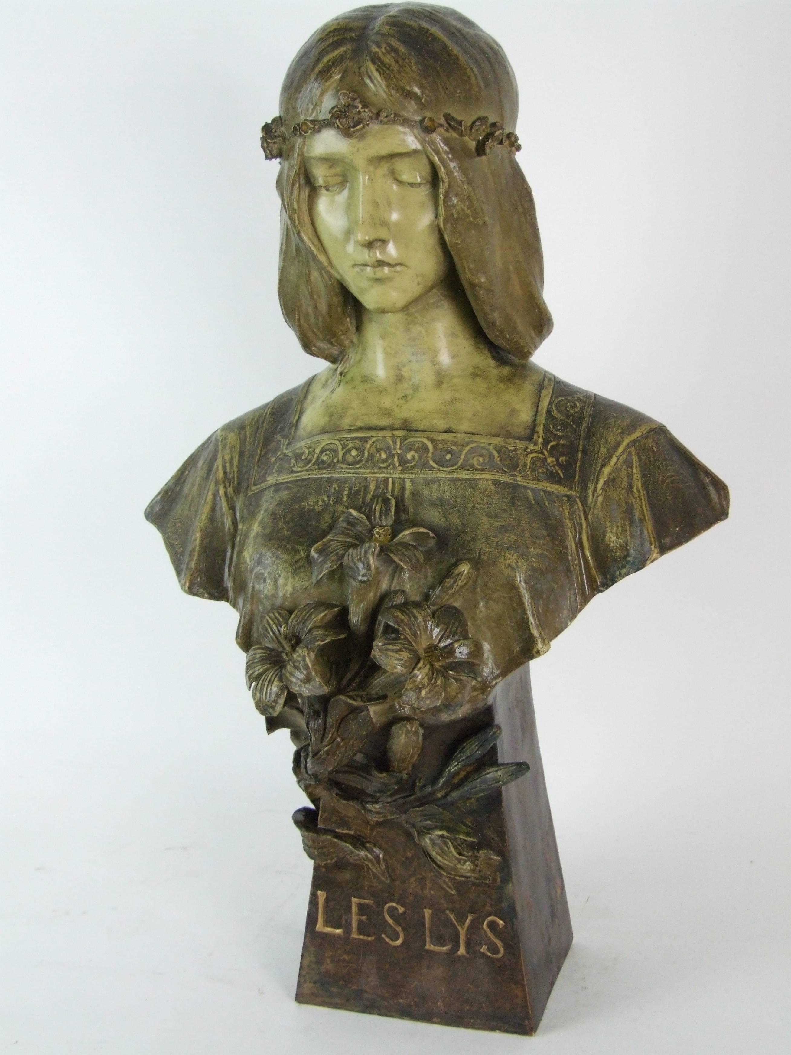Life size bust by Goldscheider. 
Austrian terracotta Art Nouveau life size bust by Goldscheider. Her title is Purete and she can be seen in the Goldscheider books, on page 54 of the Pinas book. To the base is Les Lys (The Lillies), her model number