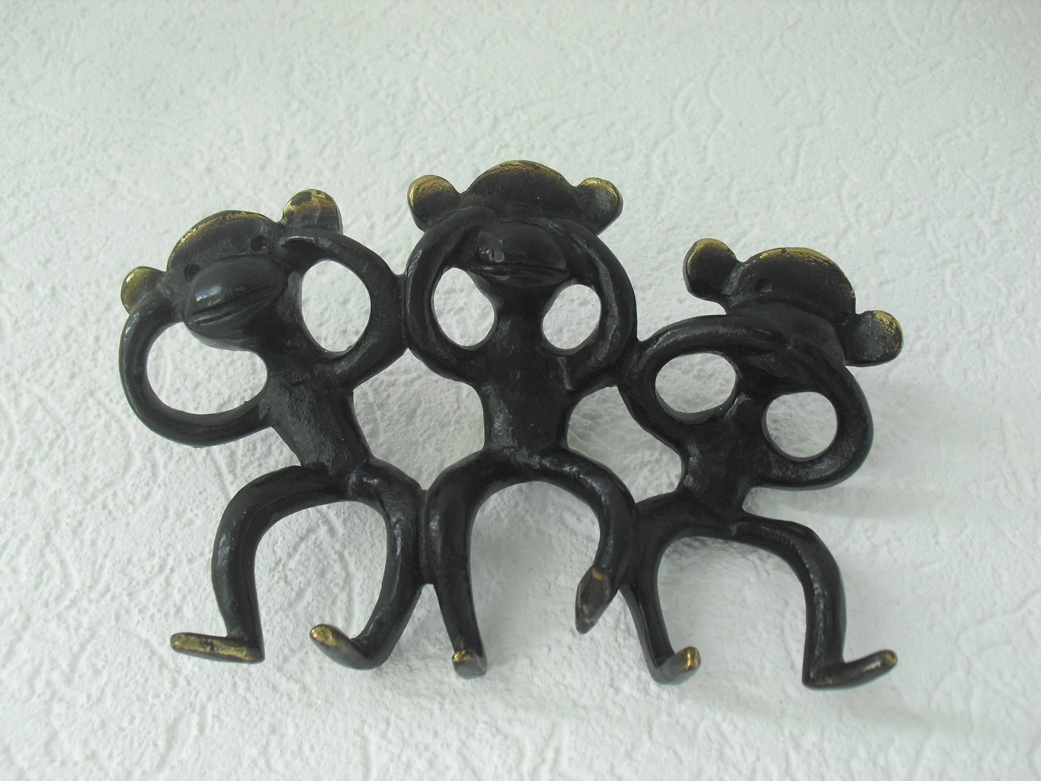 Funky blackened brass ape figurine key holder designed by Walter Bosse for Hertha Baller, Austria during the 1950s.

This is one of those items that makes you smile!