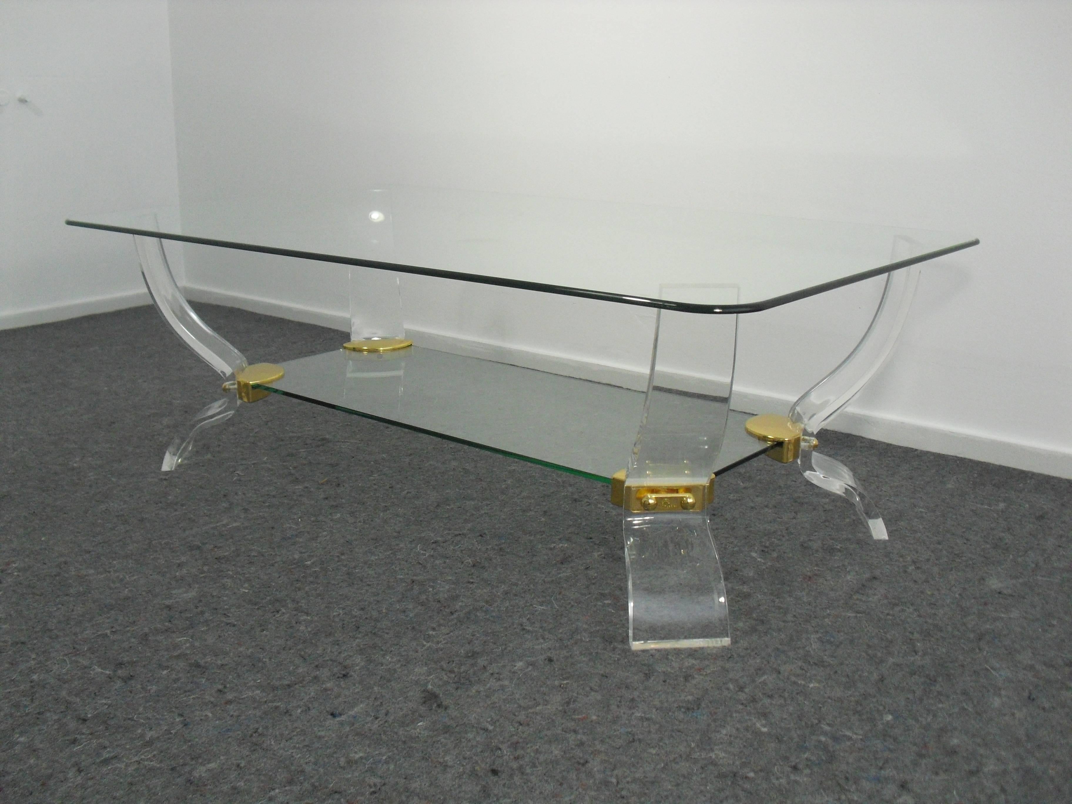 Spanish Design Perspex Coffee Table by Curvasa Meubles.

Manufacturer: Curvasa Meubles
Country: Spain
Period: 1980's
Dimensions: H40 cm x W120 cm x D70 cm.
Condition: Good condition, normal signs of use.