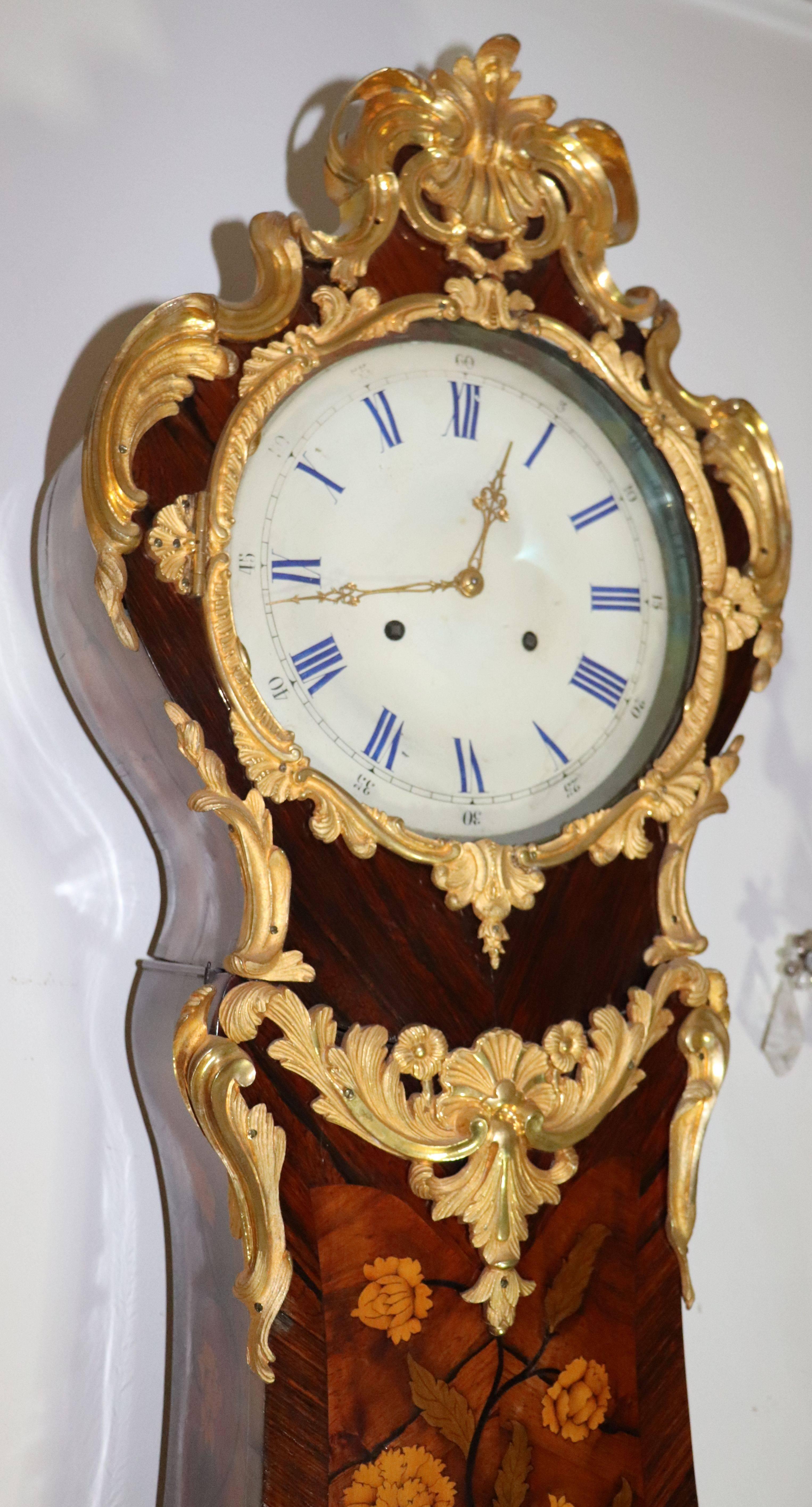 A longcase gilt bronze inlay clock middle of 19th century Linderot stockholm
movement dated 1851 signed Linderot stockholm.