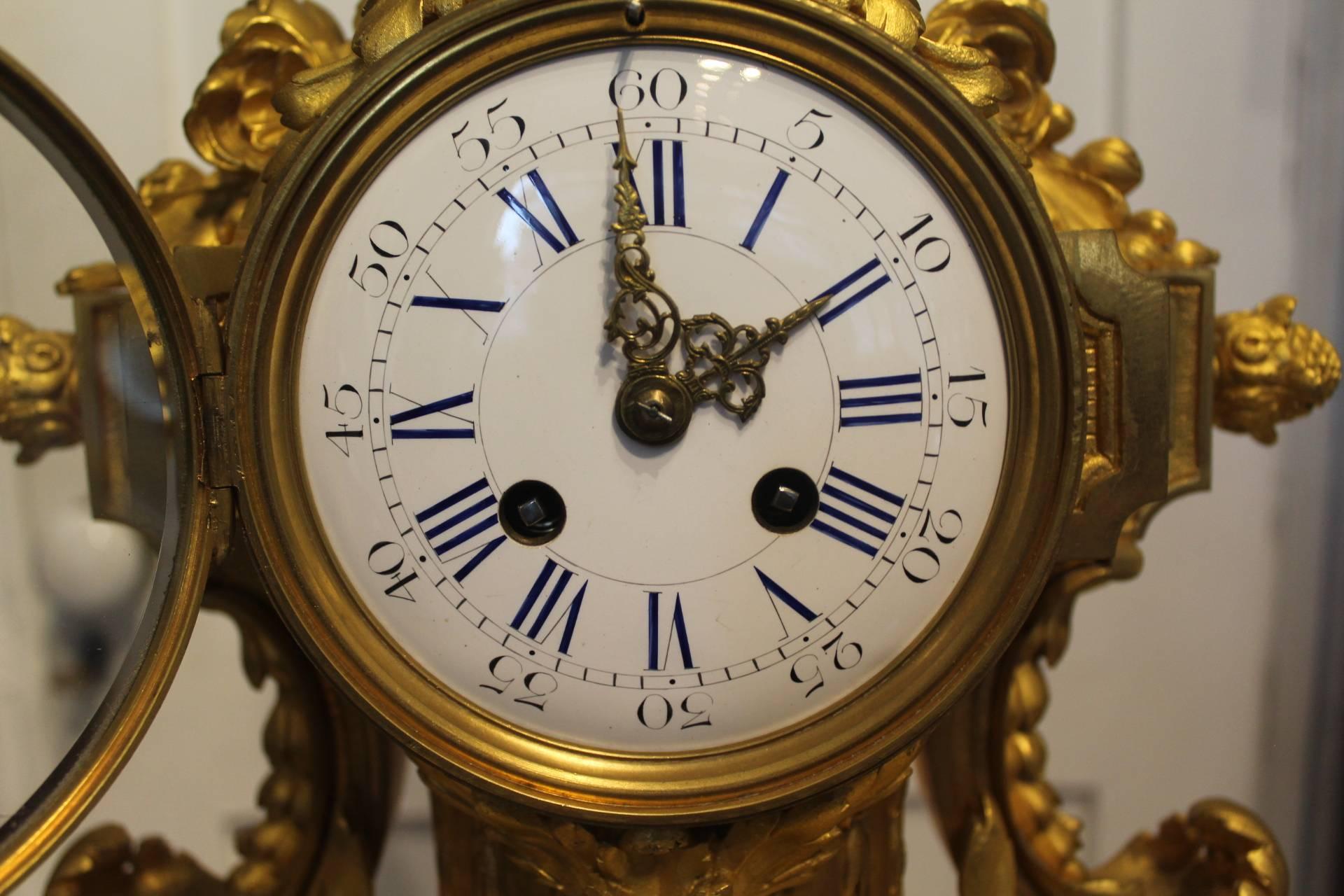 French ormolu clock, circa 1860

This beautiful clock has an eight-day movement de Paris, striking hours and half hours on a bell. The perfect white enamel dial showing both roman and Arabic numerals. The combination of the deep blue on the roman