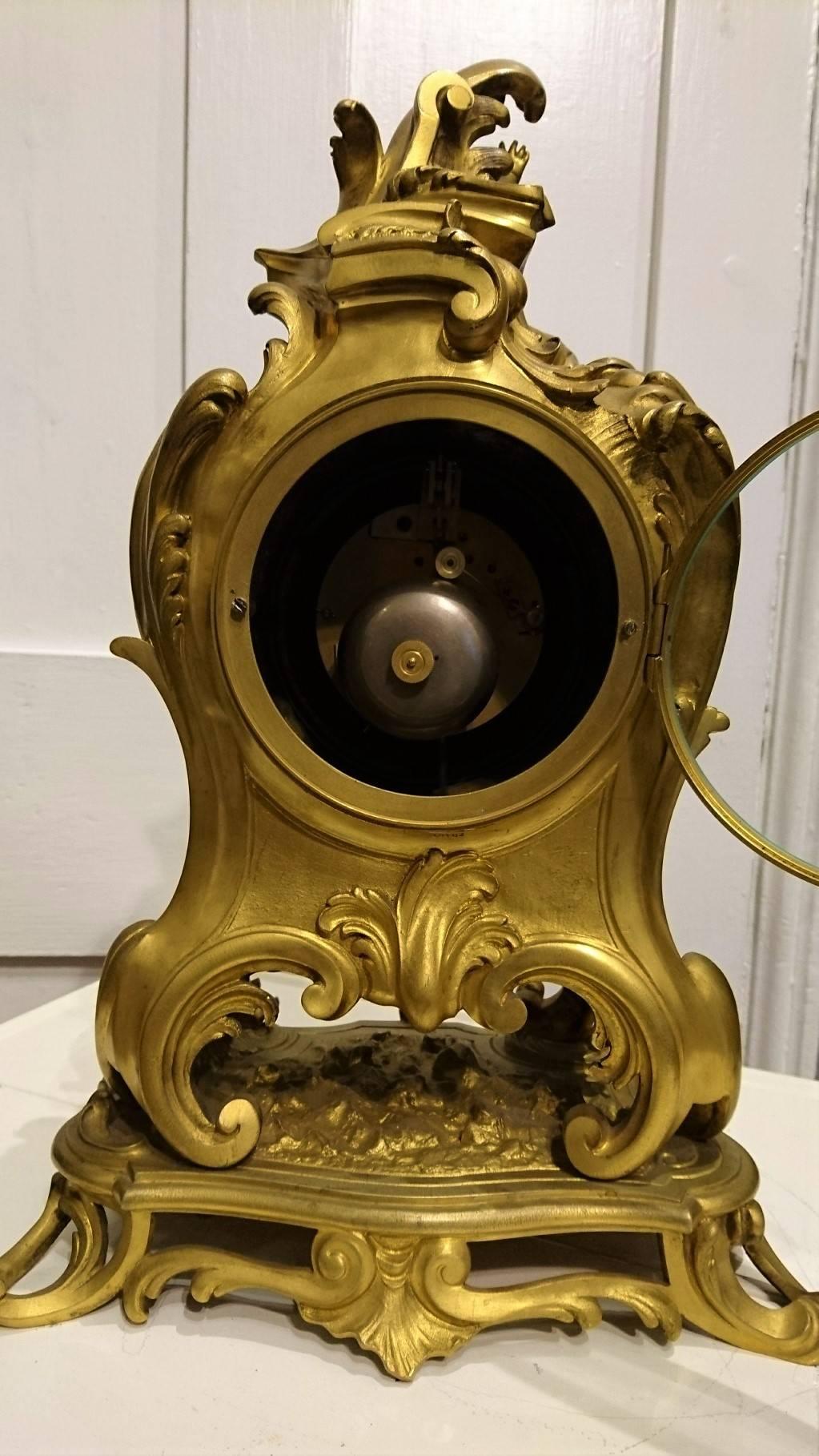 Beautiful, French Rococo style mantel clock by Vassy, Paris, circa 1860.

This stunning clock has an eight-day movement de Paris, which will strike the hours and half hours on a bell. The beautifully clear, white enamel dial, showing roman and