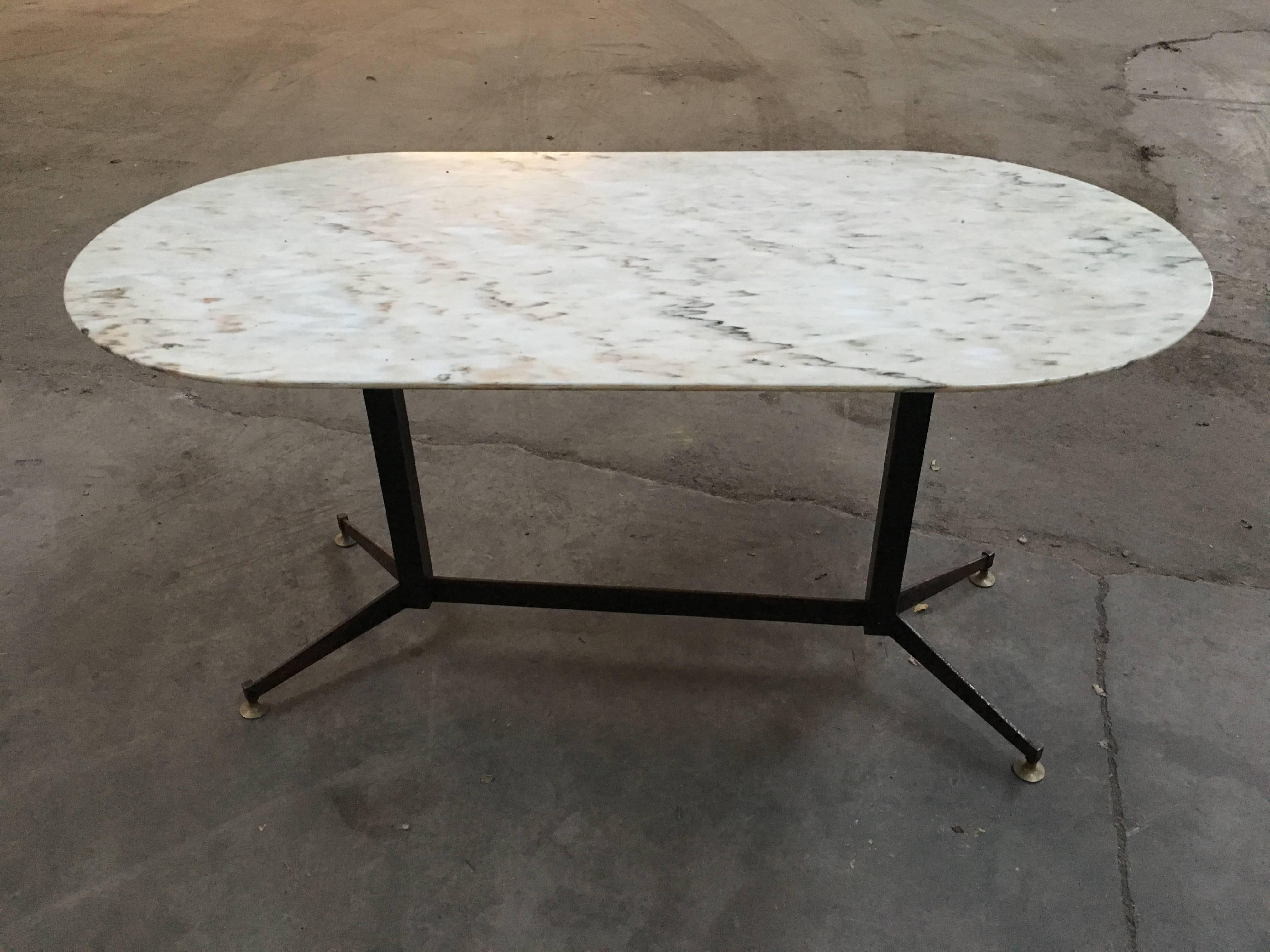 Italian table with iron base, brass feet and oval marble top from 1960s
Measurements: width cm 160, depth cm 80, height cm 80
On demand and under quotation height can be changed.