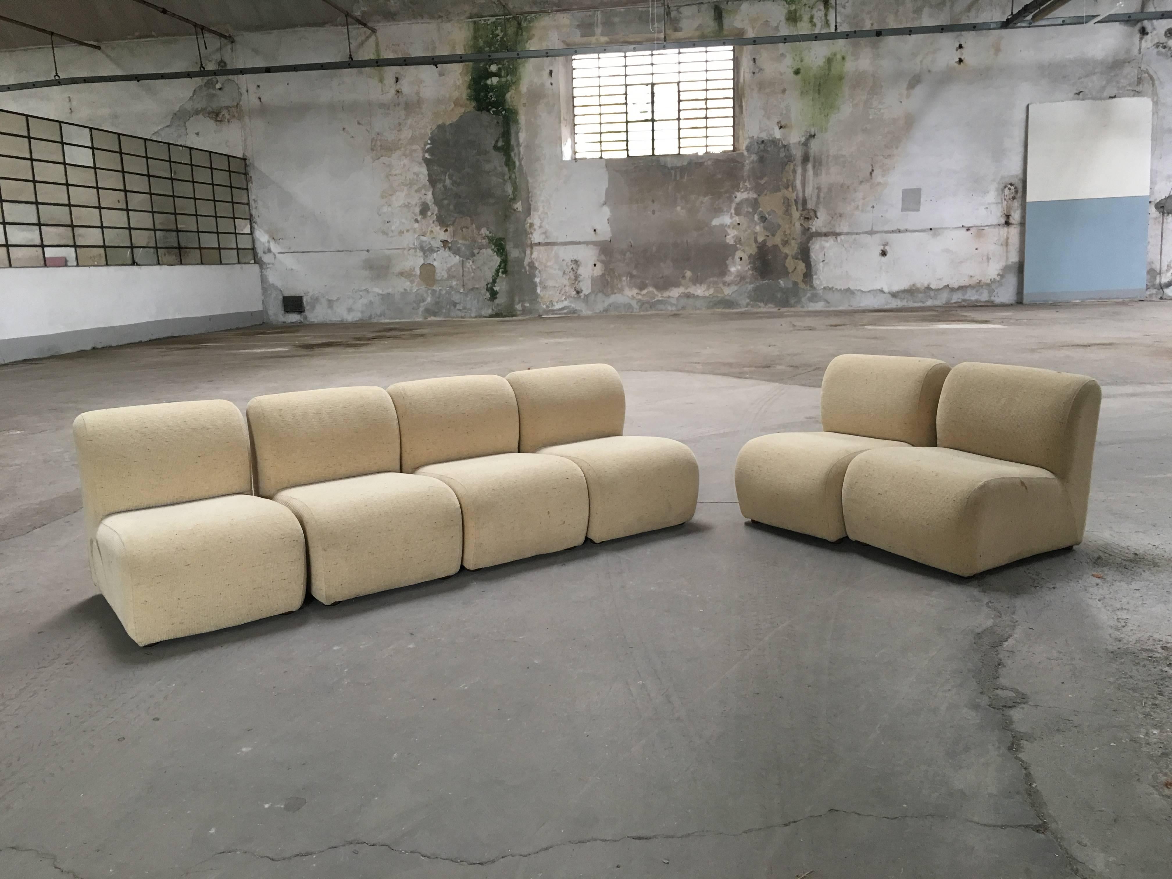 Italian Modular sofa with original tapestry in very good conditions.
The sofa is composed by six pieces.
Each piece measures: Length cm 50, depth cm 72, height cm 65, seat height cm 36
The sofa was made in Italy during the 1970s.