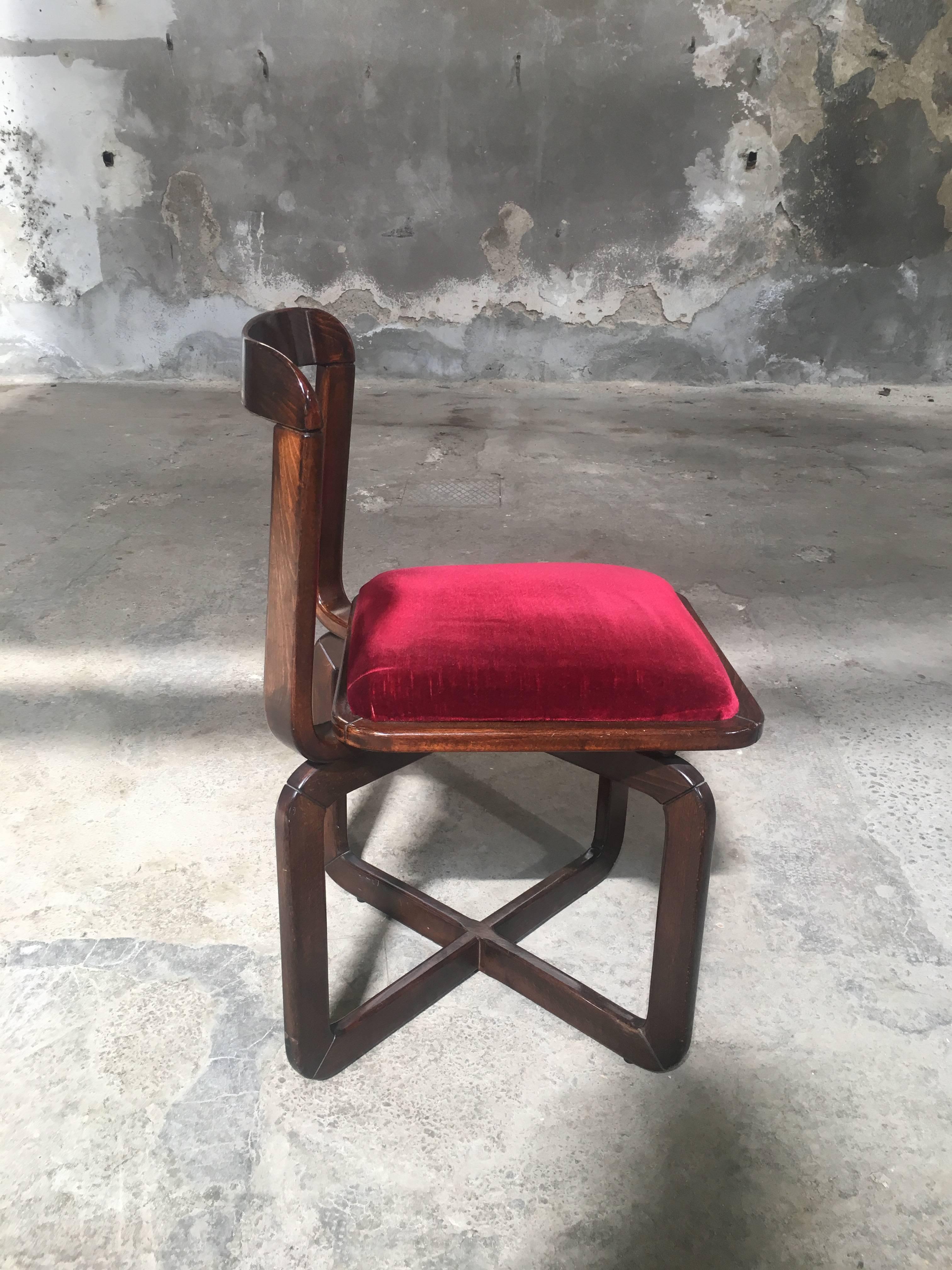 Set of four Italian side or dining chairs in chestnut wood with original burgundy velvet fabric.
The chairs are made in Italy during 1970s in the style of Willy Rizzo.
These chairs are really comfortable and in very good conditions.