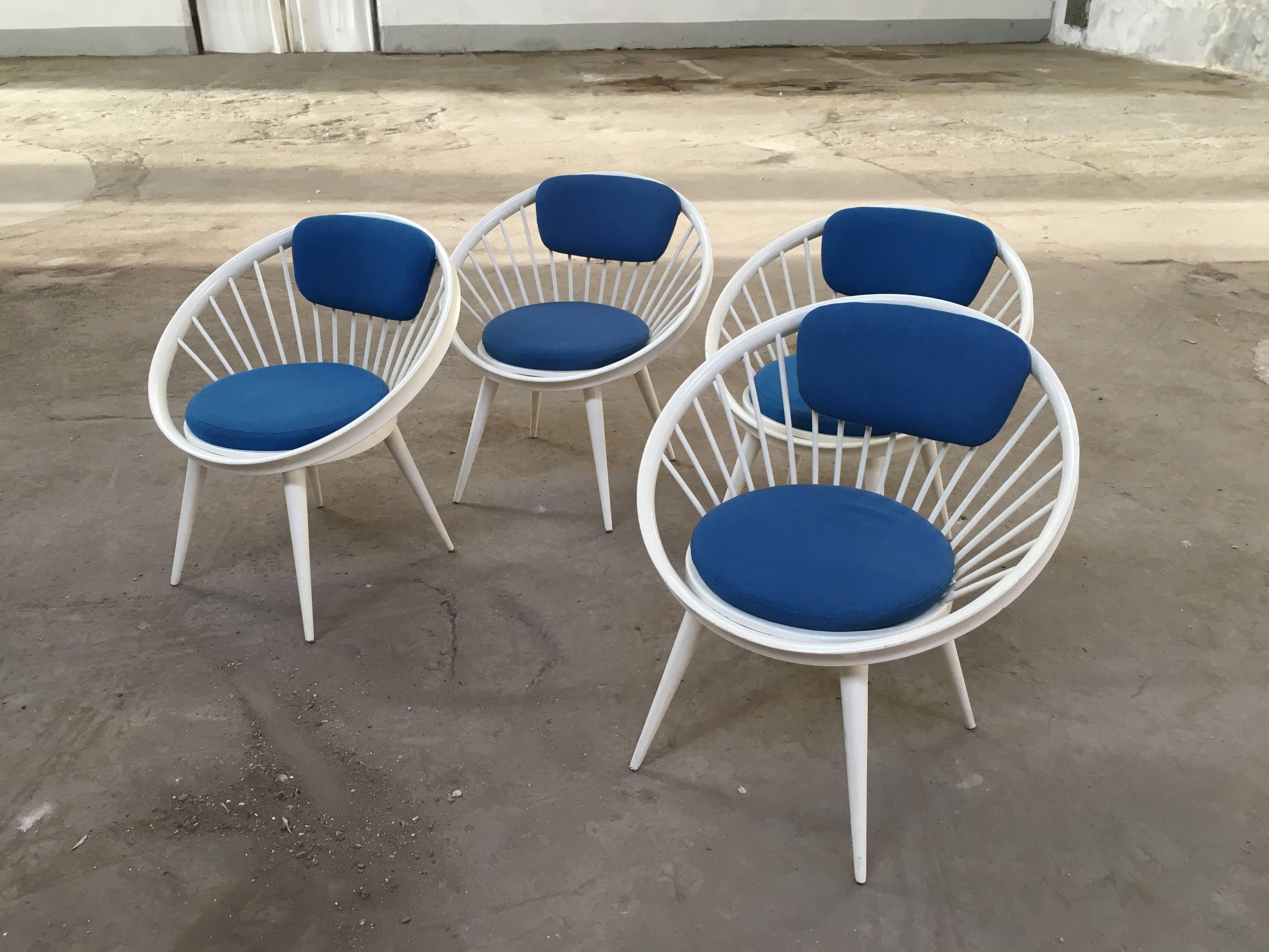 Set of four laquered wood Swedish circle chairs with fabric cushions from 1960s by Yngve Ekstrom.