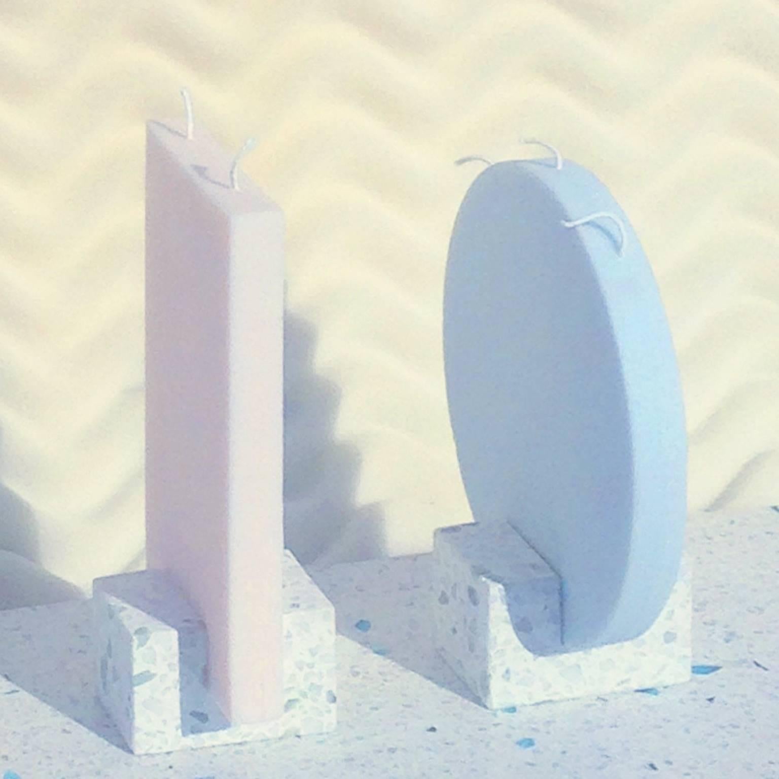 The Monolith contemporary hand-cast terrazzo candle holders were conceived in collaboration with Jessica Martin (Nun) and inspired by the designers' surrounding architectural landscapes. Both from Miami, they borrowed elements of Art Deco