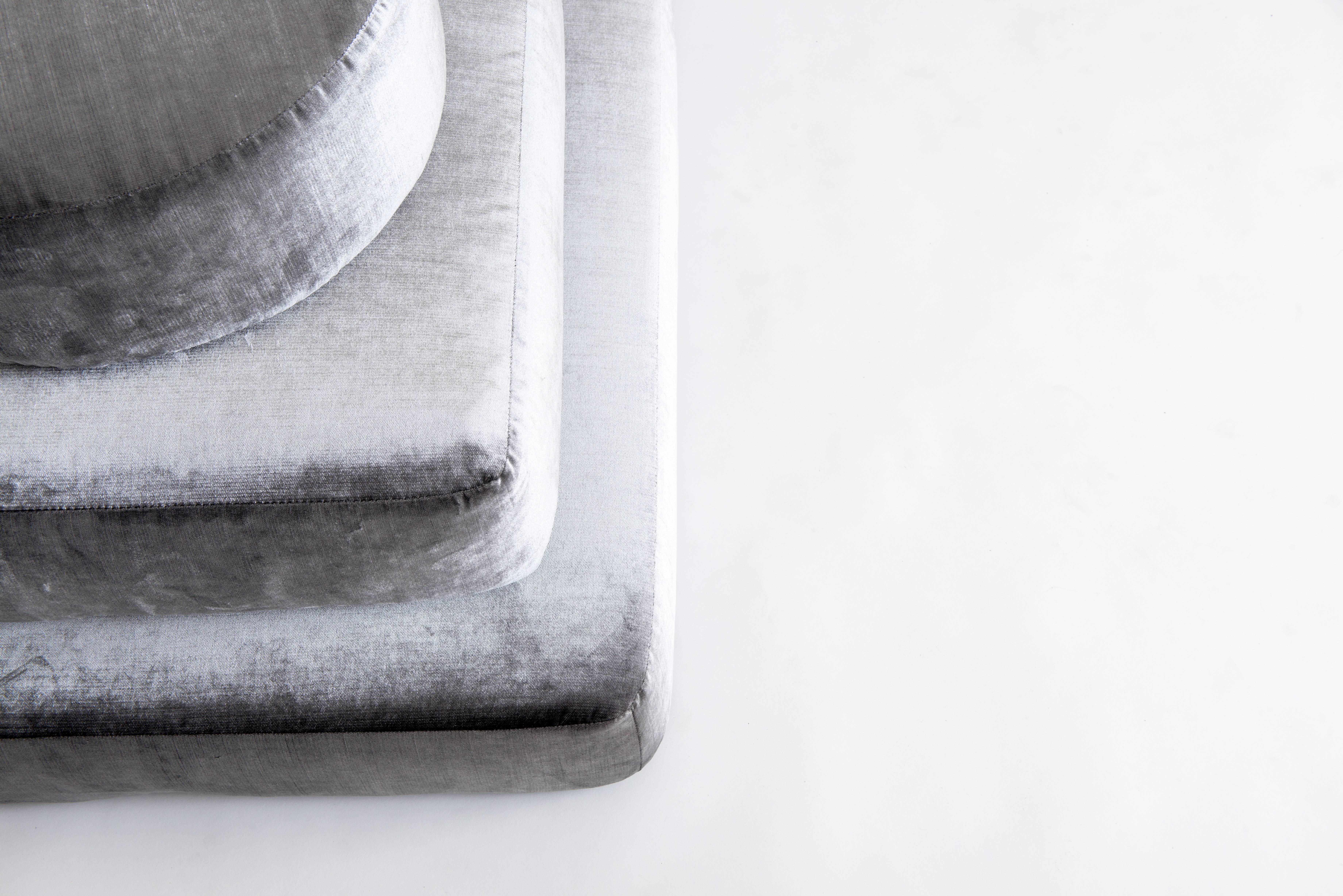 The Stacks bench is an elegant interpretation of stacked meditation stones and offers the functionality of meditation cushions. Upholstered in a luxurious velvet, each layer can be removed to provide the opportunity for a different seated