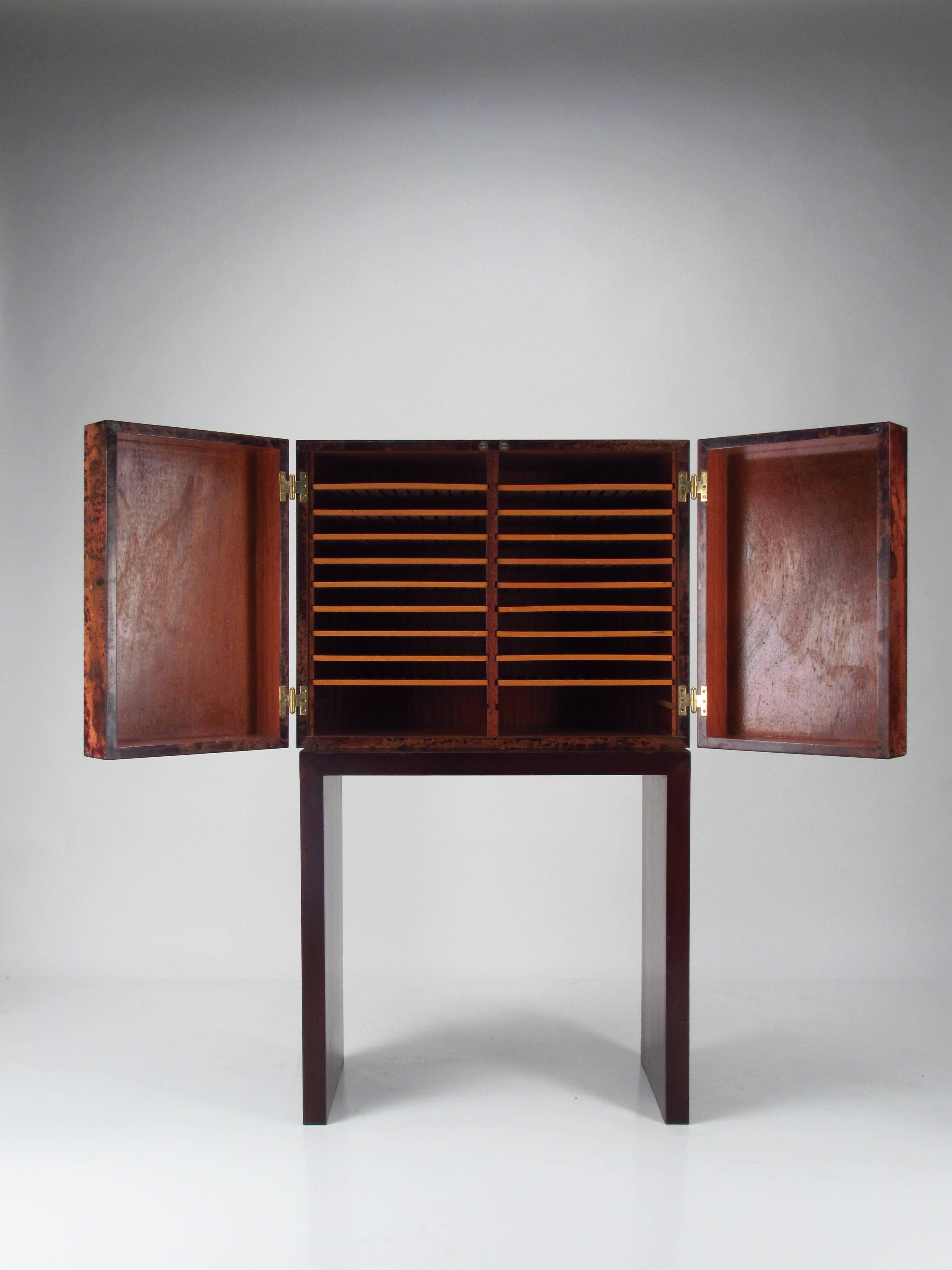 Aldo Tura Lacquered Goatskin Cabinet made in Italy in the 1950s. Originally designed as a humidor (but not used as one) this cabinet also makes a superb magazine rack, a place to store important papers, or perhaps a chic storage cabinet for fashion