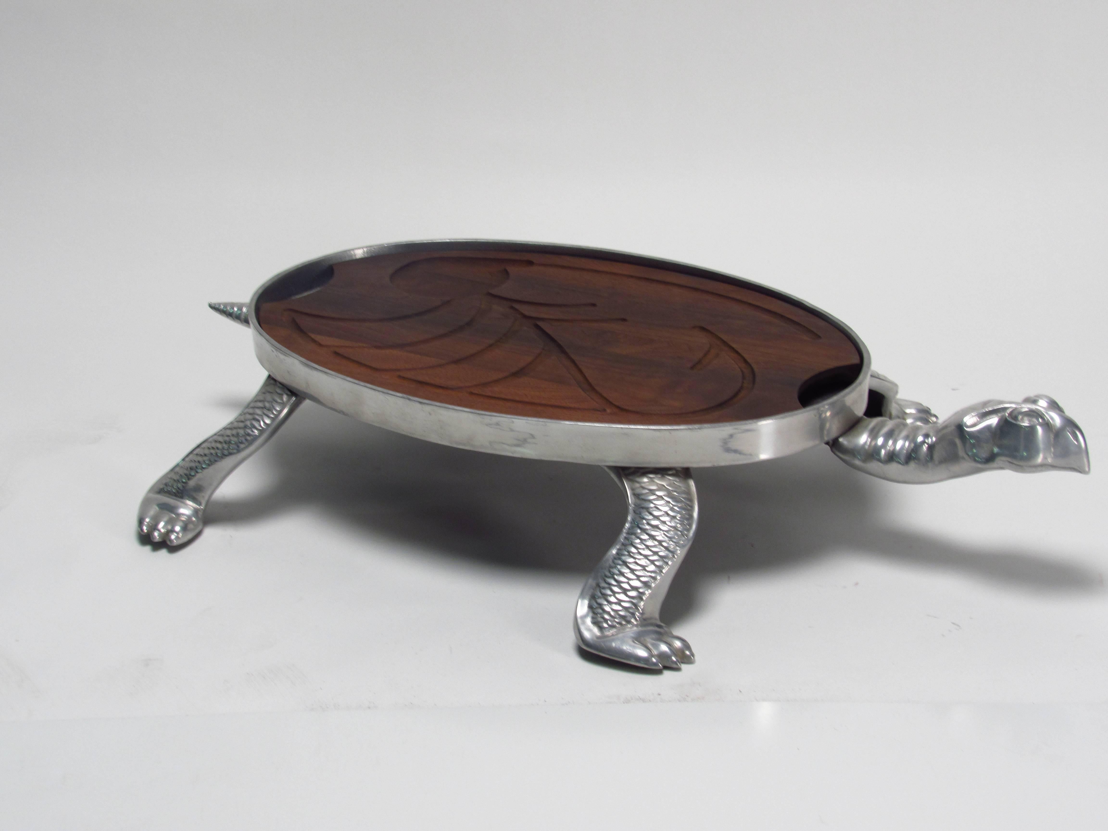 Inspired by nature Arthur Court's Turtle Serving Platter and Dome is handcrafted and richly hand polished from durable cast aluminum. Non-tarnishing and food safe.  

40