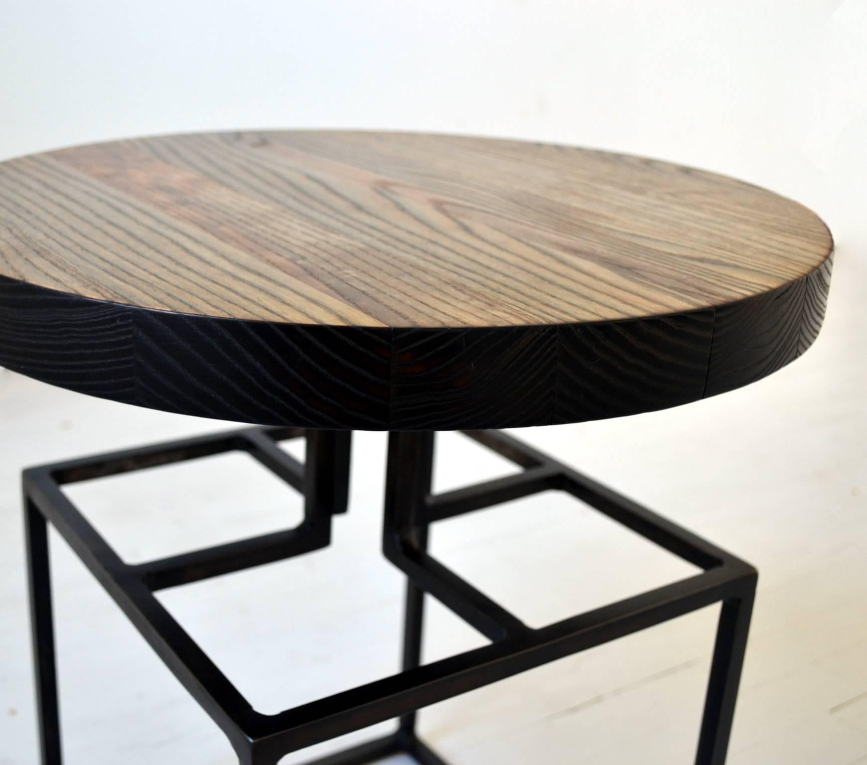 Taking a design cue from our Archetype chair, The Willard table is created with a steel base and paired with a round wooden top with a charred edge. Finished in our Philadelphia studio by a select team of craftspeople, their skill and careful
