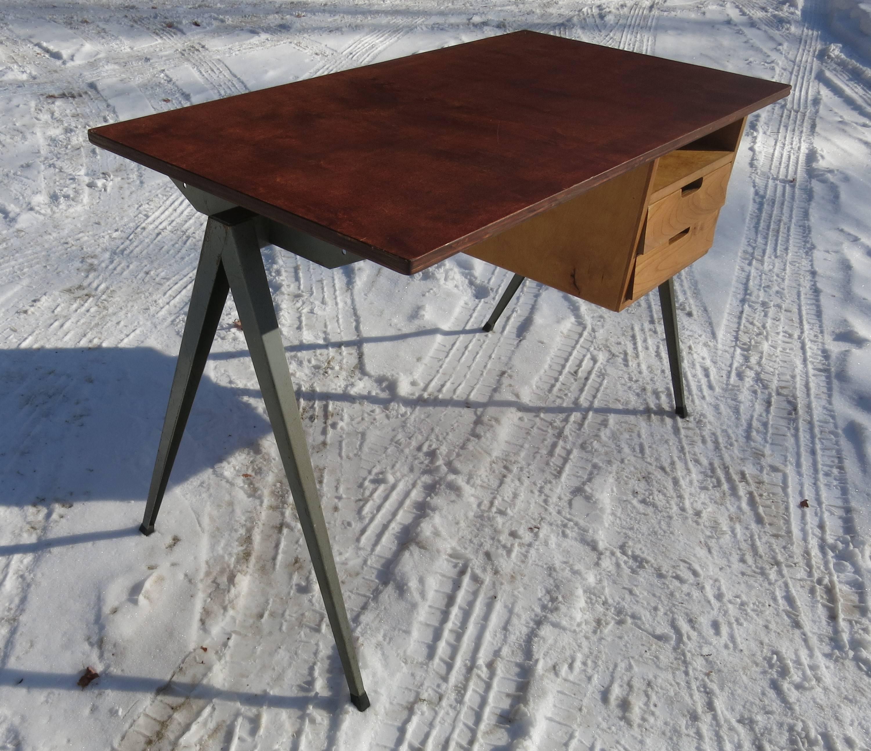 Vintage 1950s Marko desk, made in the Netherlands. Nice minimalist style Dutch desk with plywood top. A few dings and chips on the top and light rust on the legs, it is 23.5