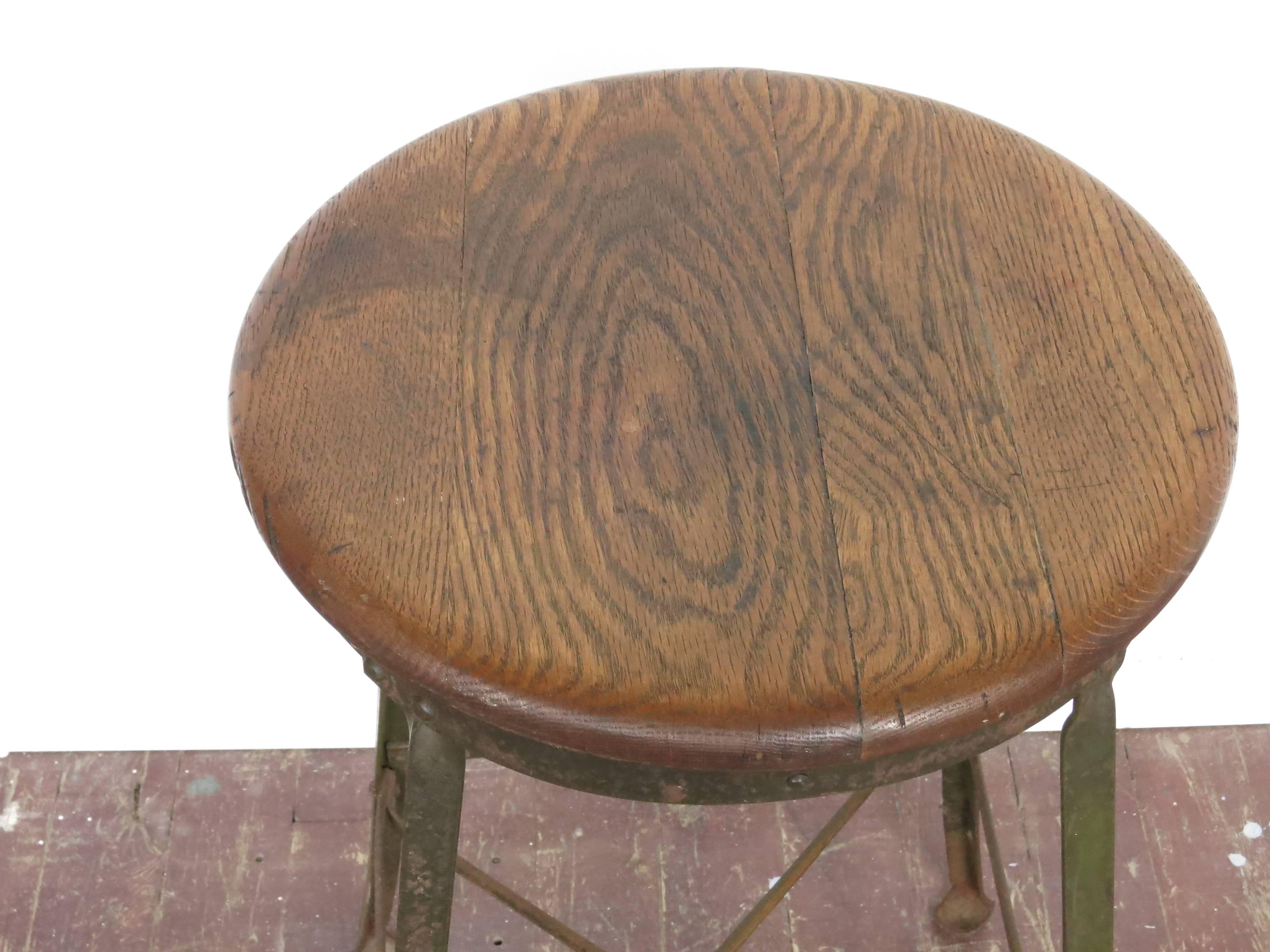 Vintage angle steak Industrial stool, 27' high. Seat is 13.5