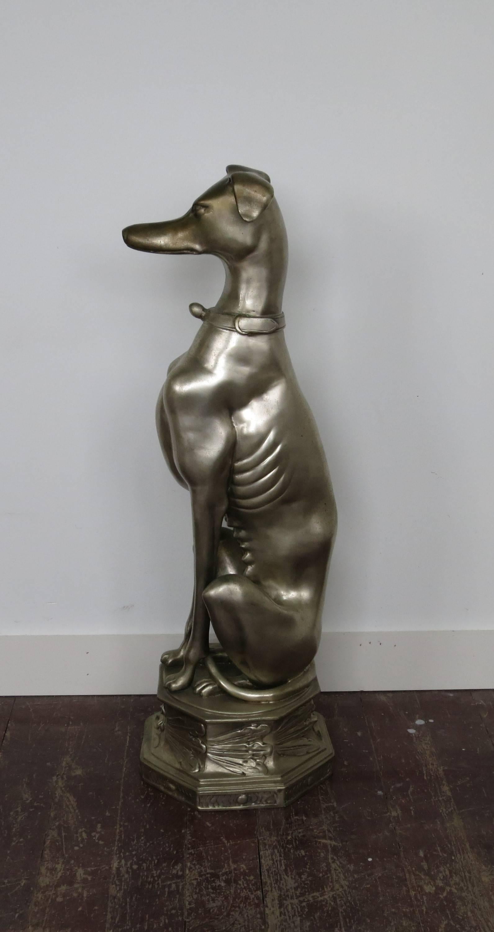 Silvered cast bronze whippet. It is 30.5' high and the base is 10