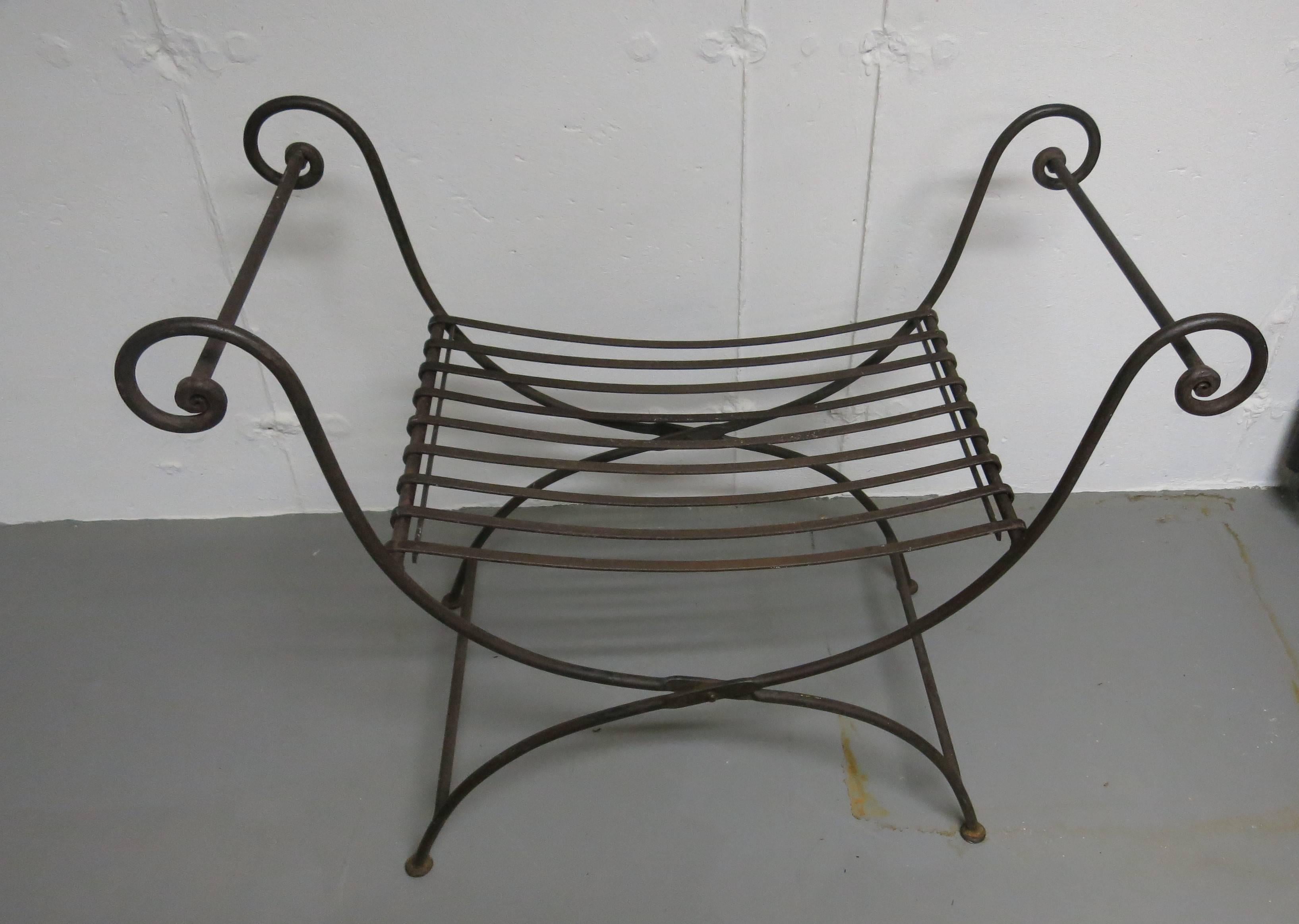 Vintage iron folding bench nicely rusted. It is 33.5