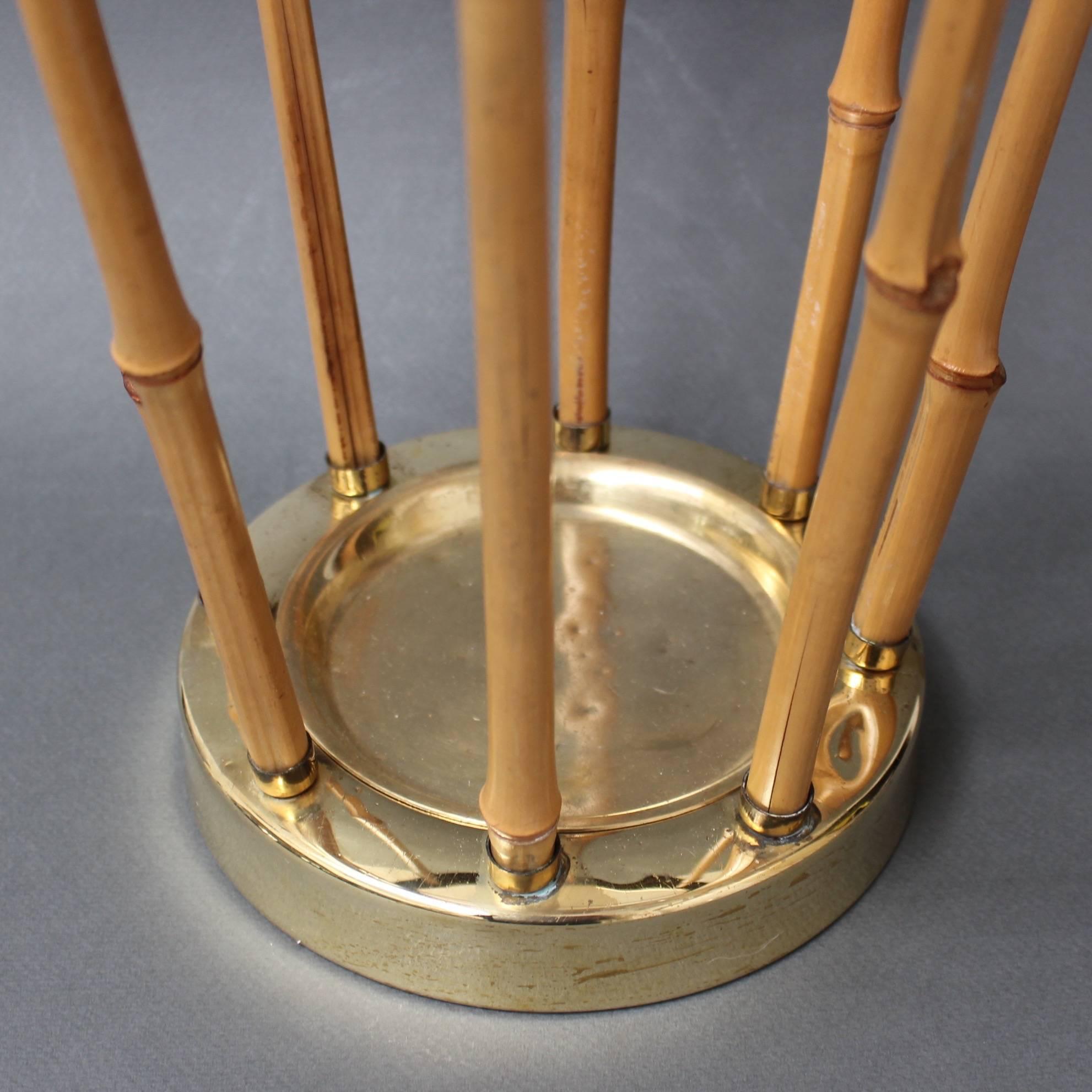 Very sought-after vintage brass and bamboo umbrella stand, made in Austria circa 1950s. The brass is polished to a golden tone and is in excellent vintage condition.

Dimensions:

H 41 cm

D 26 cm.