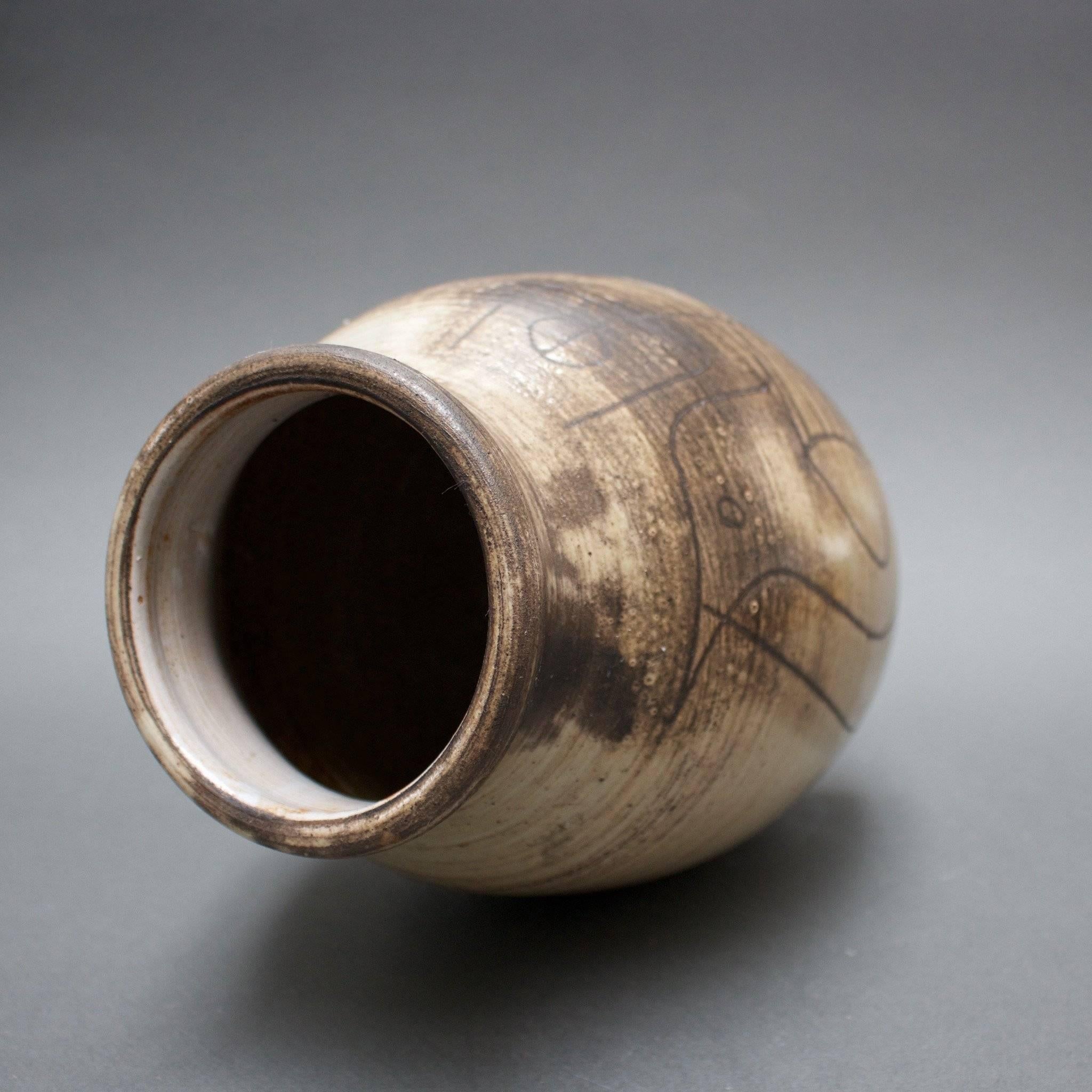 Jacques Pouchain (1925-2005) left Paris and gave up his architectural training in the 1950s for the South of France to devote himself to art and his pottery studio at Dieulefit. He produced highly personal work and more commercial pieces as well