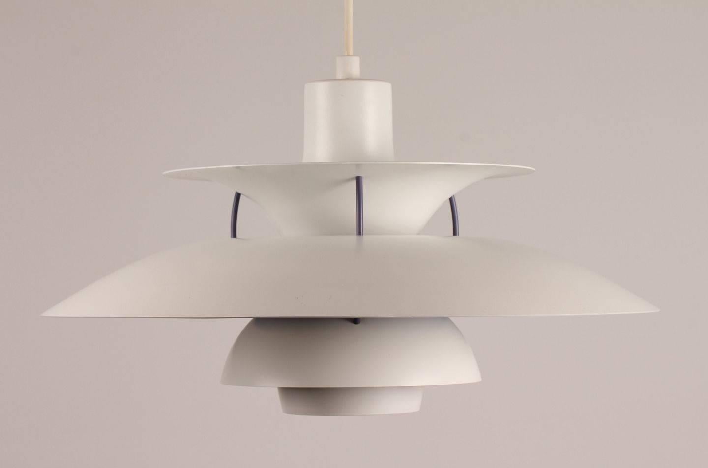 The 'PH 5' pendant was designed by Poul Henningsen and produced in Denmark by Louis Poulsen during the 1960s. A Danish Classic who has hung in most Danish homes in the 1960s.

The pendant is made from white-lacquered metal and is in a very good