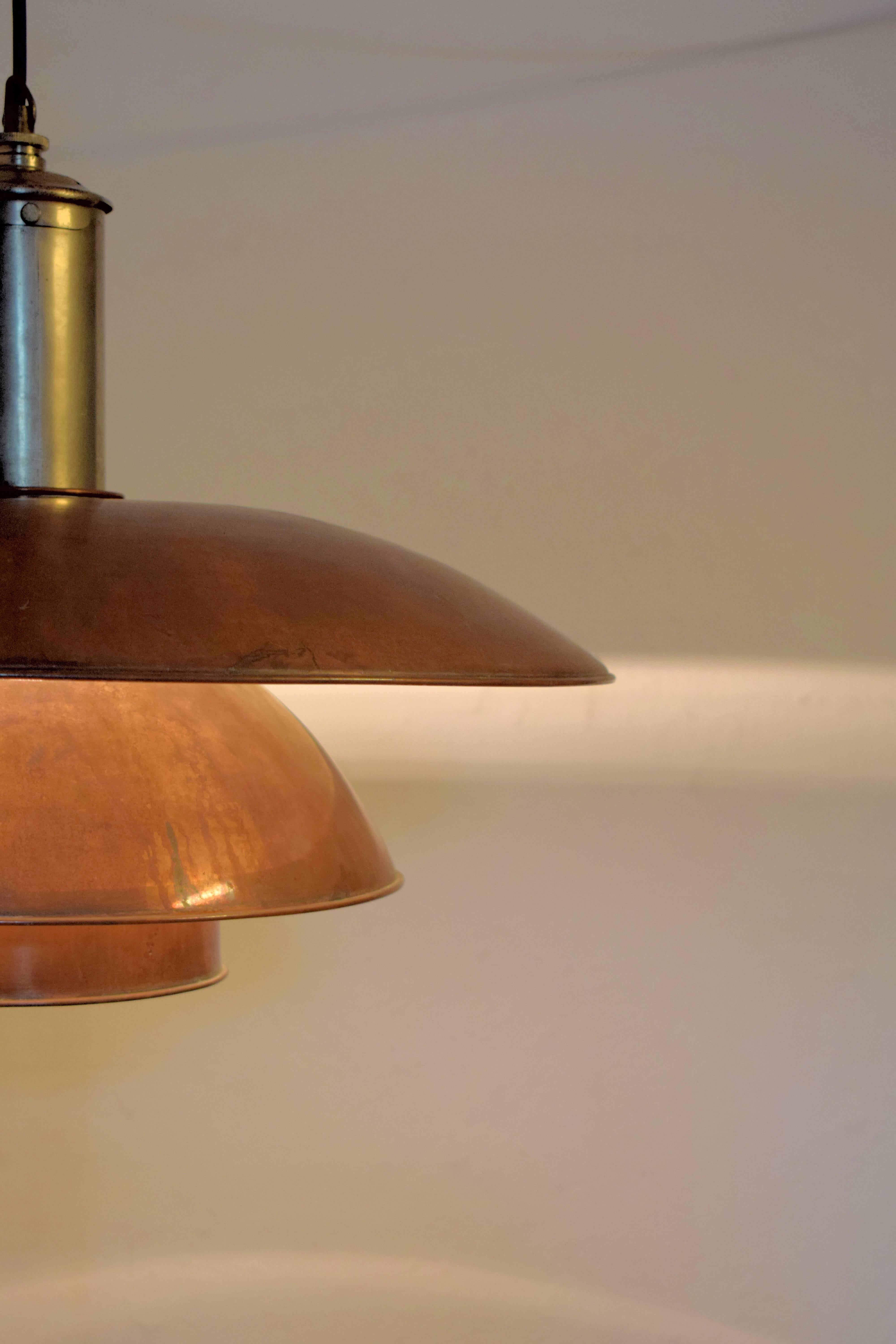 Poul Henningsen 6/6 pendant with copper shade, iron stem, cast tripod shade holder stamped Pat Appl
Produced by Louis Poulsen in 1926-1927, stamped PAT. APPL.
Has been made for a limited period only 1927-1928.