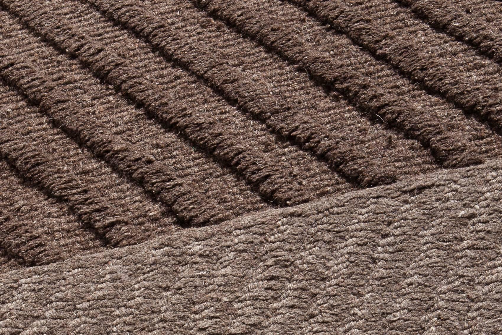 Himalayan Undyed is a collection of design rugs, handmade in Nepal from 100% Himalayan undyed wool pile knotted to a cotton warp.
 
The yarns are unbleached and undyed, coming from Tibetan highland sheep whose natural color hues range from creamy
