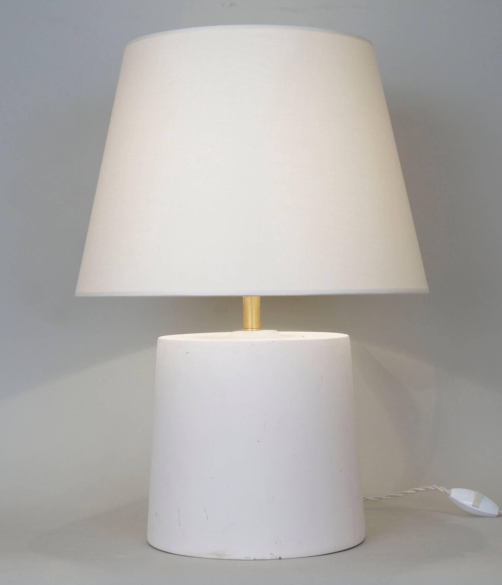 Unglazed ceramic table lamp in white biscuit, shade custom-made, rewired with twisted silk cord and olive switch line and US compatibility plug on request.
Measures: Ceramic only H 21 cm. in 8.3 H
with shade H 59 cm. in 23.2 H.