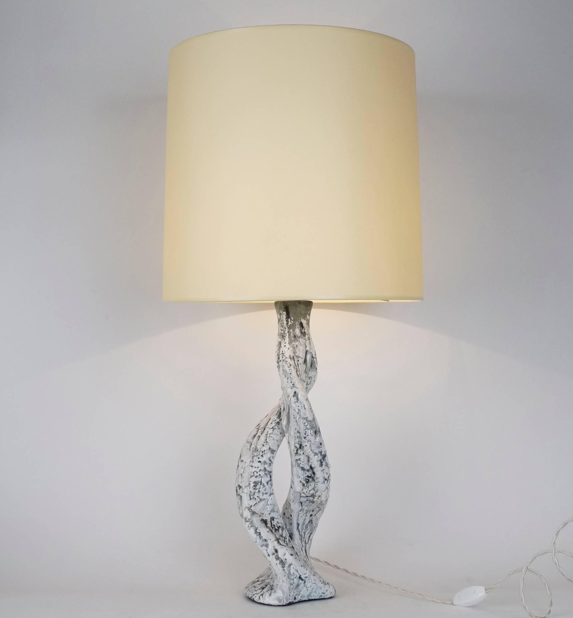 Enamelled ceramic table lamp by Louis Giraud, Vallauris.
Signed on the back.
Custom-made fabric lampshades.
Rewired with twisted silk cord.
US standard plug on request.

Measures: Ceramic: 41 cm-16.1in.
Height with lampshade: 75 cm-29.5 in.