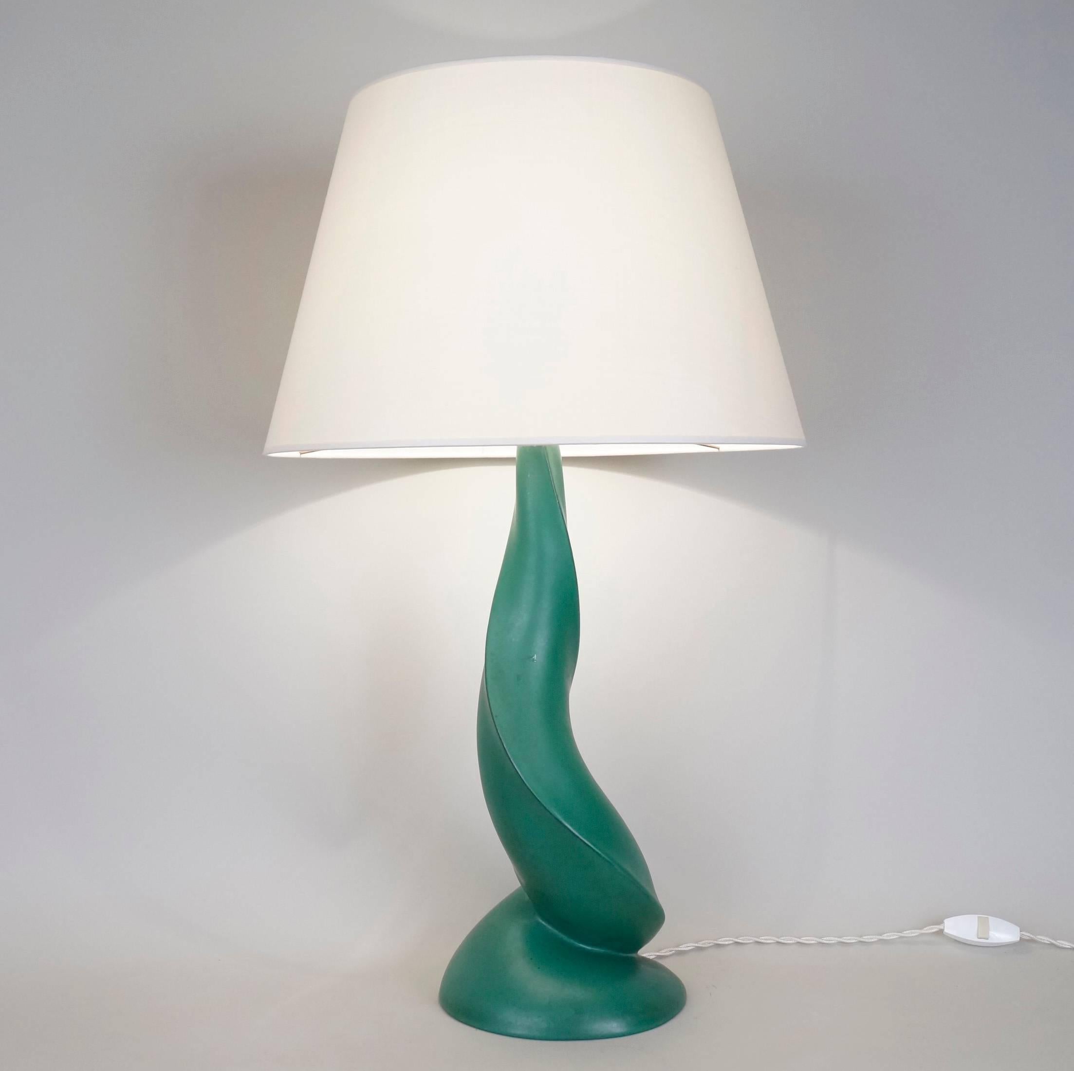 Green satin ceramic table lamp by Francis Cova signed on the back.
Custom-made fabric lampshade.
Rewired with twisted silk cord.
US standard plug on request.
Ceramic body height: 39 cm - 15.4 in.
Height with lampshade: 61 cm - 24 in.