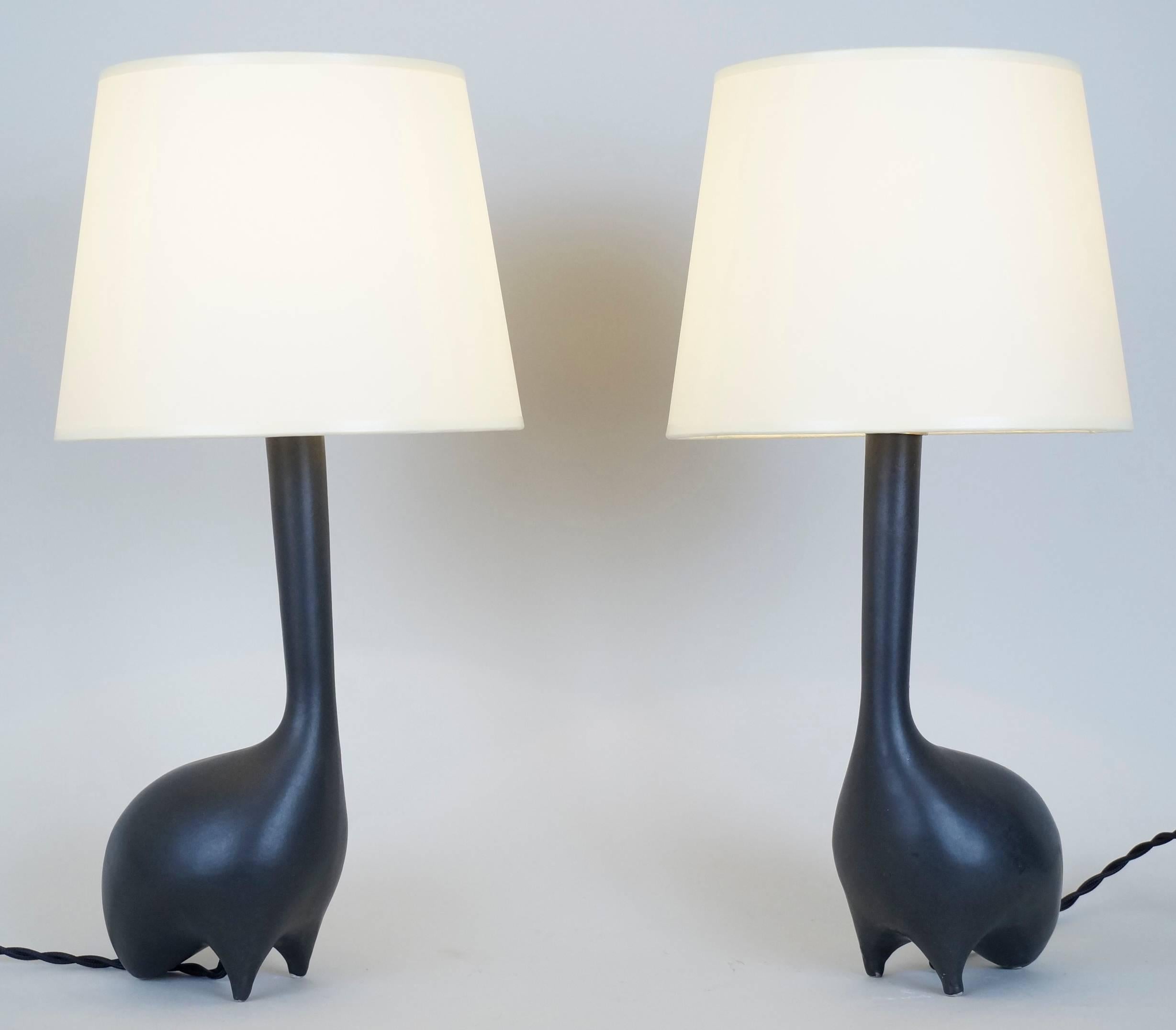 Pair of bird shape black ceramic table lamps, custom-made fabric lampshade, rewired with twisted silk cord.
US standard plug on request.
Ceramic body height: 23 cm – 9.1 in.
Height with lampshade: 36 cm – 14.2 in.