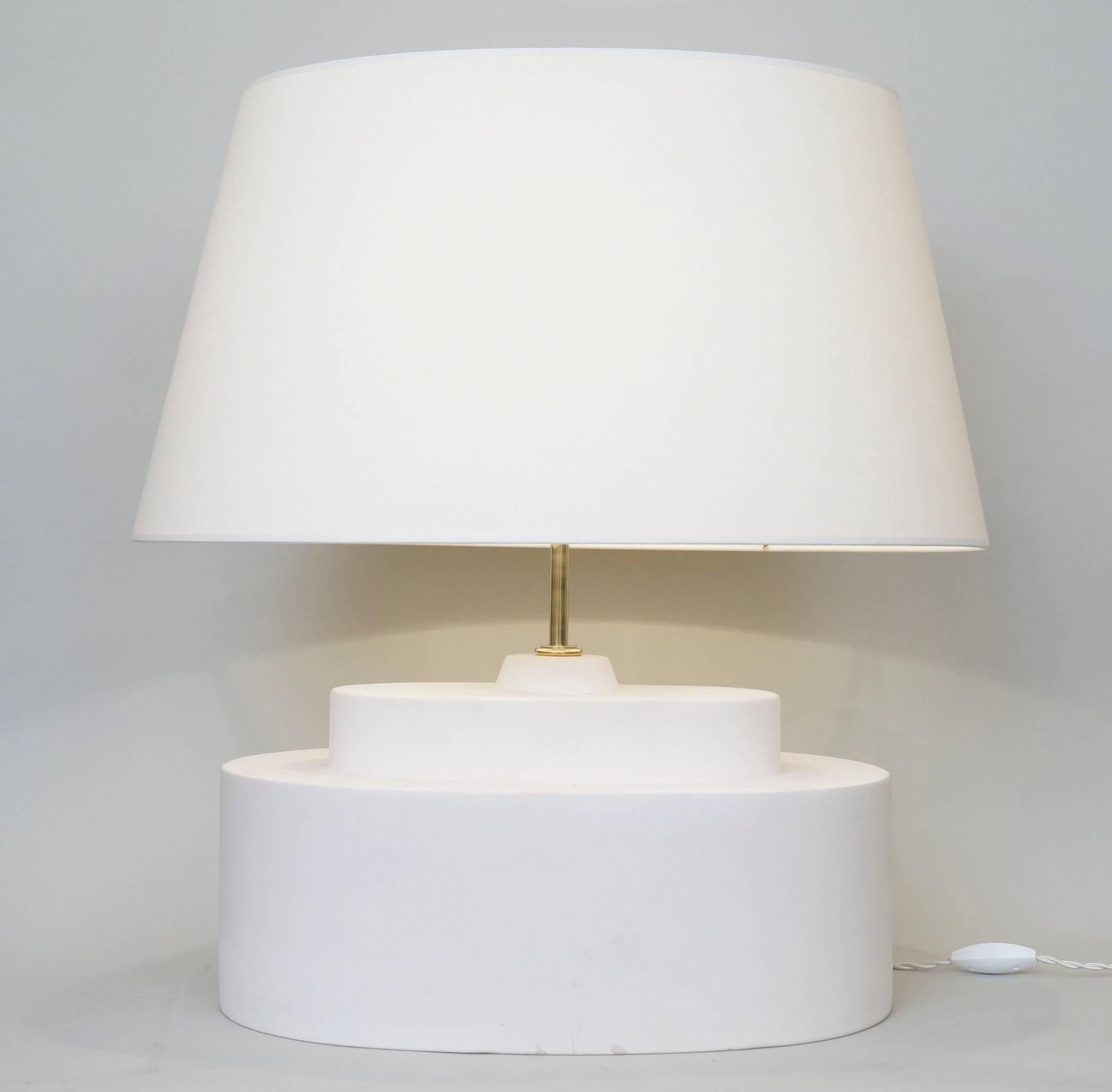 Un-enamelled white ceramic table lamp, ceramic factory of Desvres custom-made fabric lampshade, rewired with twisted silk cord.
US standard plug on request.
Ceramic body height: 22 cm - 8,7 in.
Height with lampshade: 55 cm - 21,7 in.