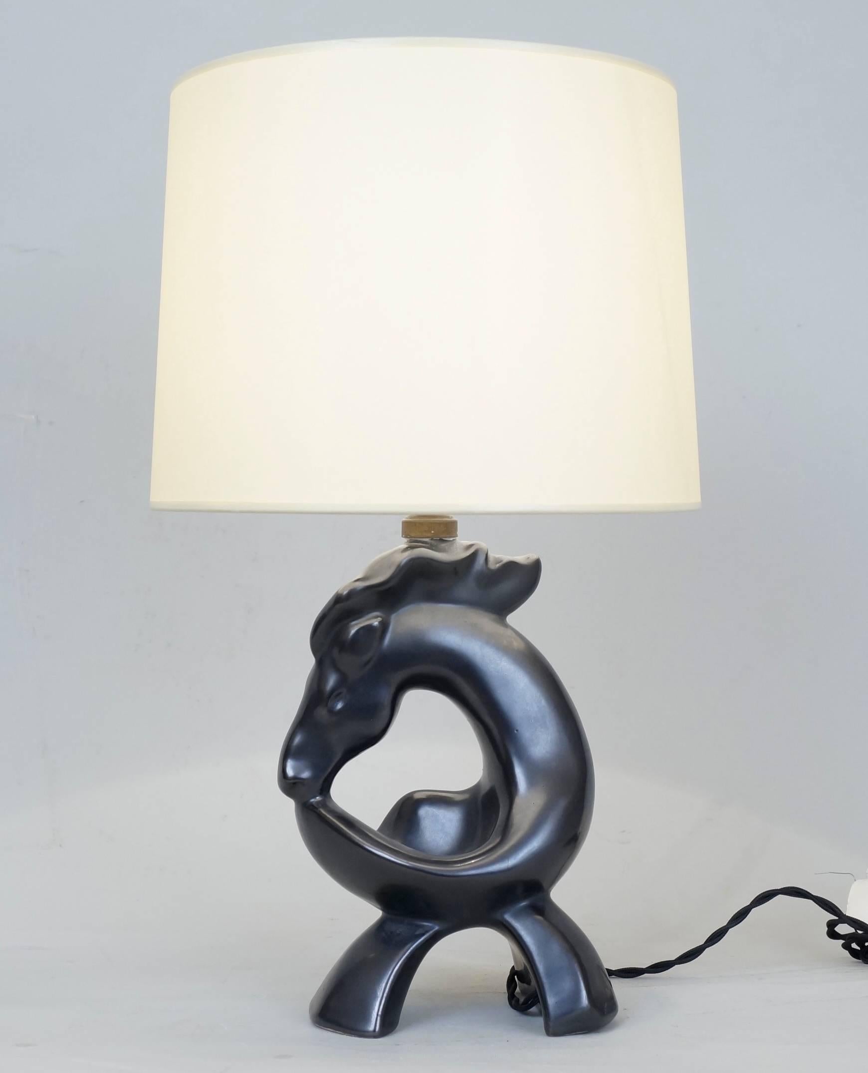 Horse shape black ceramic table lamps.
Custom-made fabric lampshades.
Rewired with twisted silk cord.
US standard plug on request.
Measures: Ceramic body height 21 cm – 8.3 in.
Height with lampshade 41 cm – 16.1 in.
 