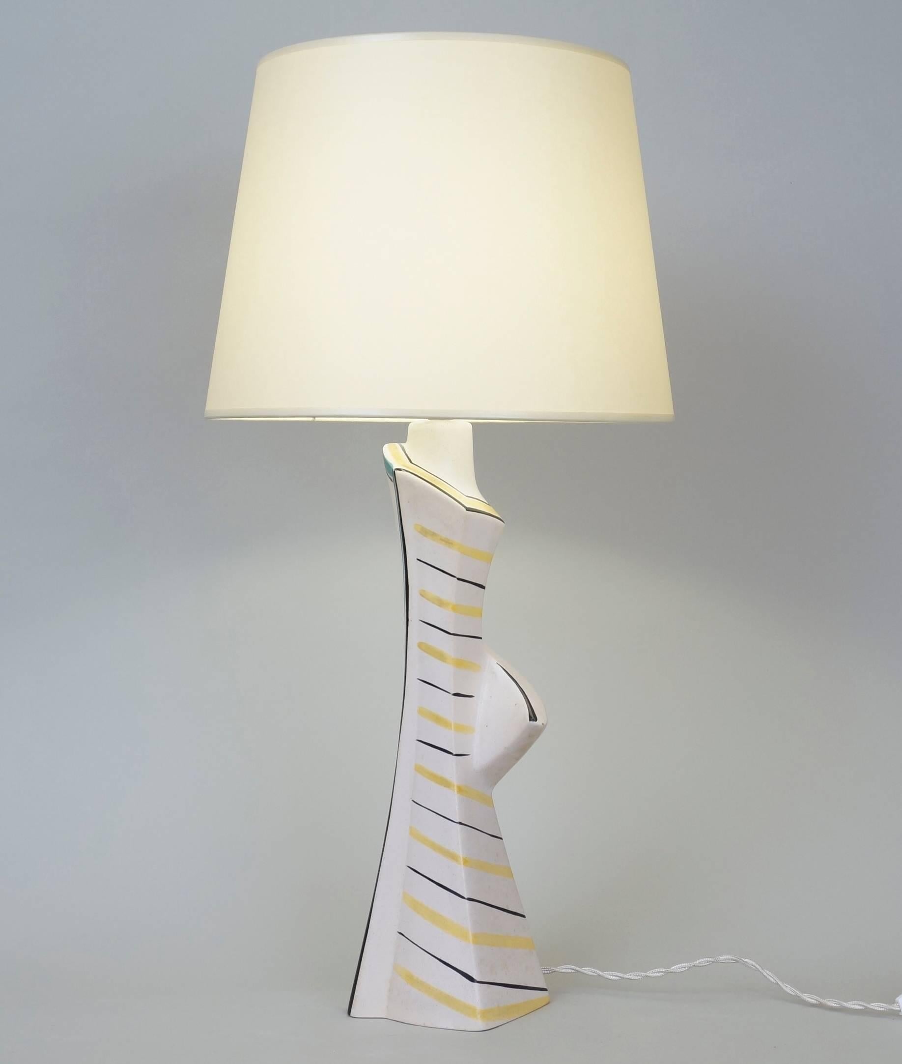 Multi-color ceramic table lamp.
Custom-made fabric lampshades.
Rewired with twisted silk cord.
US standard plug on request.
Measures: Ceramic height 36 cm - 14.2 in.
Height with lampshade 56 cm - 22 in.
      
