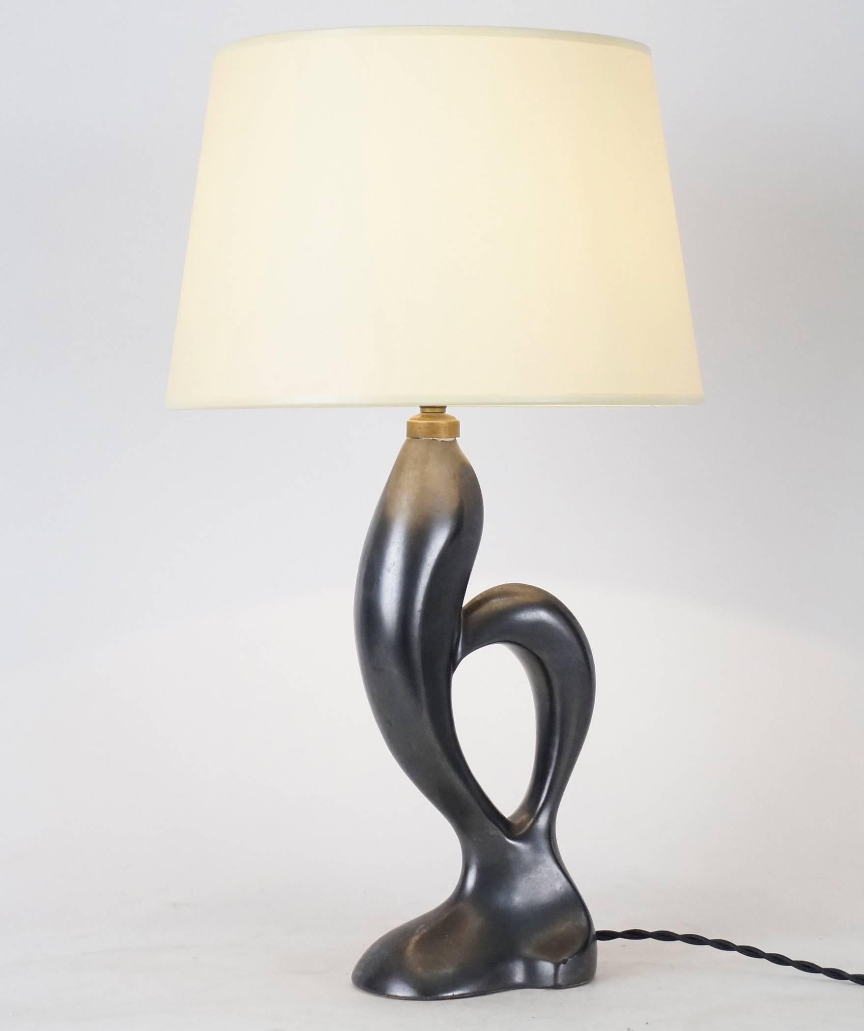 Zoomorphic black satin ceramic table lamps, custom-made fabric lampshade, rewired with twisted silk cord.
US standard plug on request.
Ceramic body height: 26 cm – 10.3 in.
Height with lampshade: 44 cm – 16.3 in.
 