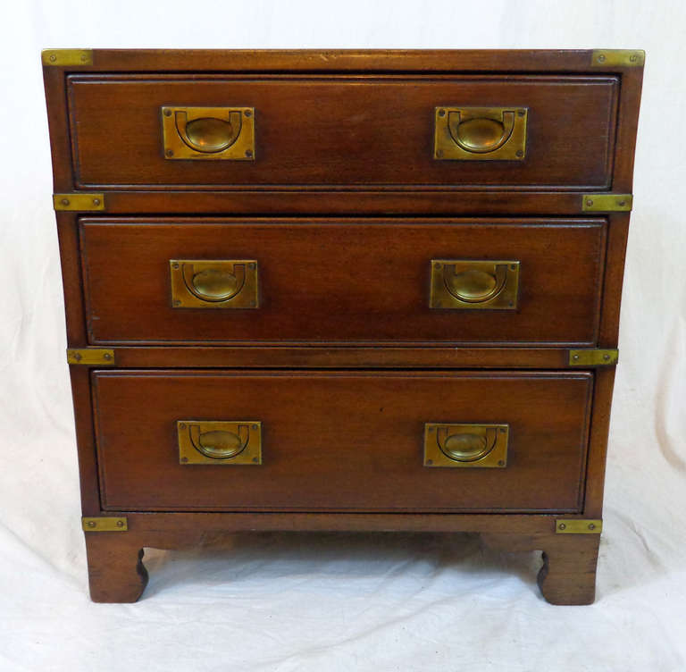 Charming Harrods of London Kennedy military Campaign chest of drawers. Mid-20th century three-drawer Kennedy Campaign chest with brass pulls. Made by Kennedy for Harrods of London and imported into the US by Manheim. Dovetail connections. This piece