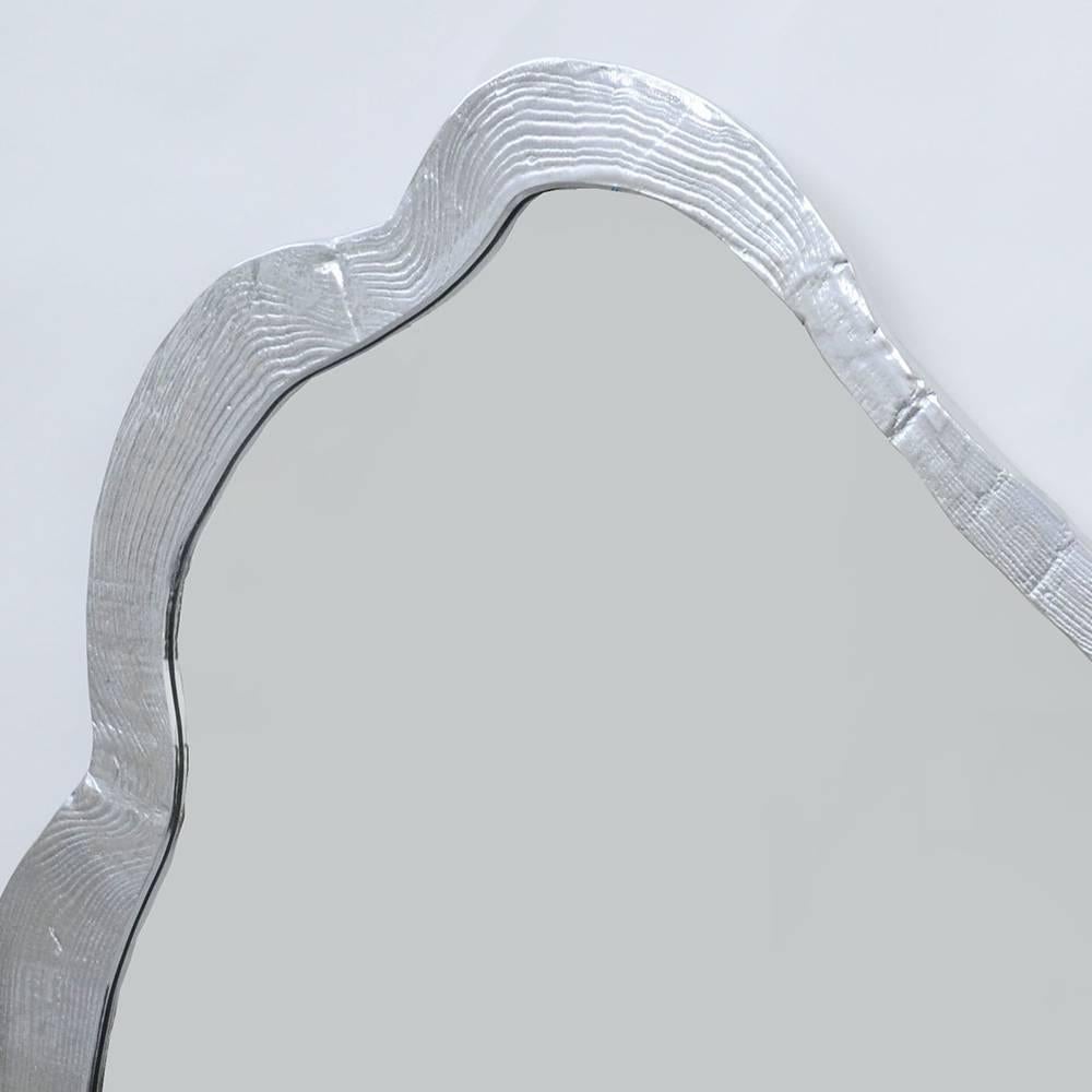 Cast aluminum frame imitating wood grain and mirror.