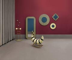 Nanook of the North Rocking Seat with metal legs in gold in MDF, Plywood & Resin
