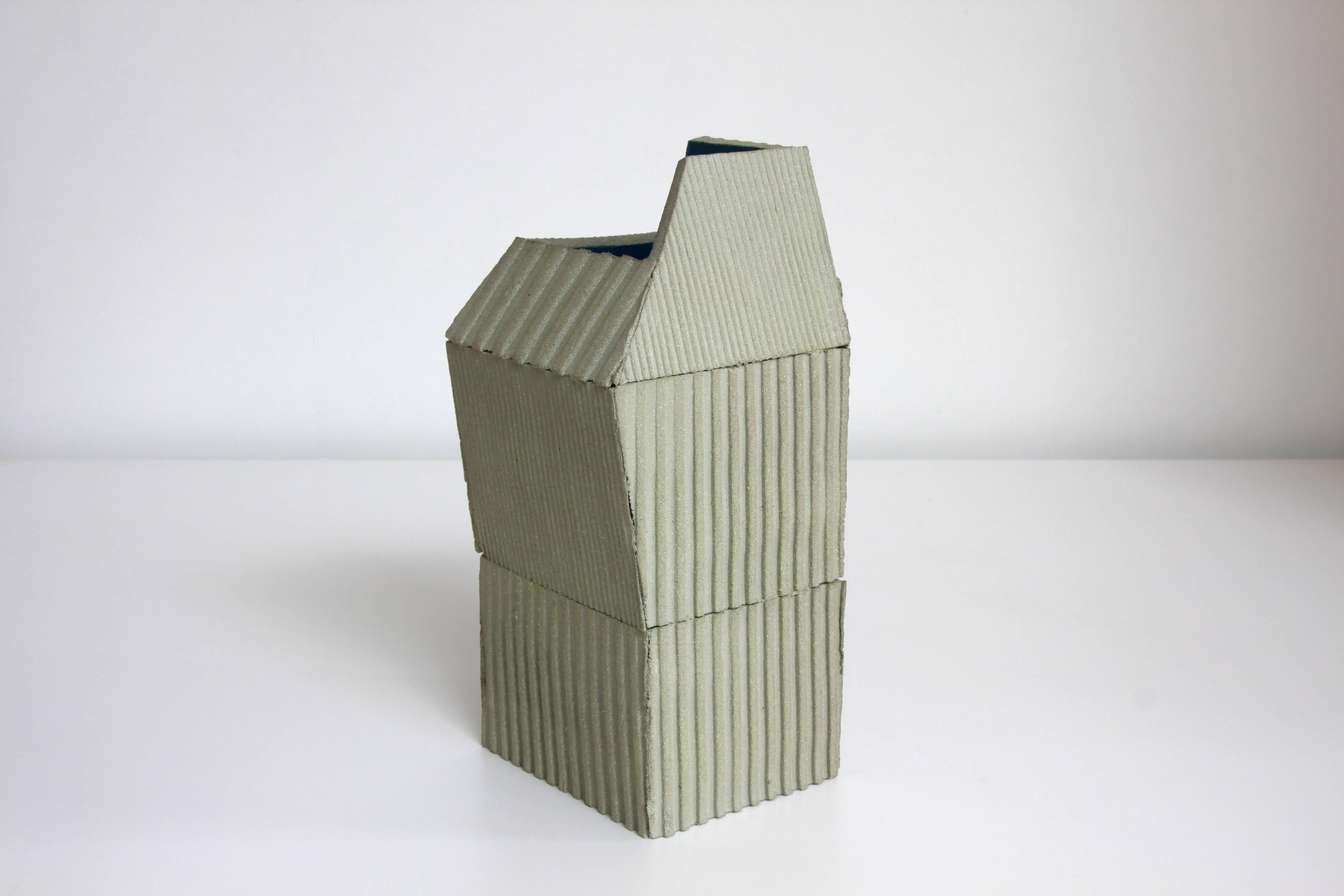 “Uralito” are vases created by Formabesta and assembled by hand inspired by the constructive solutions of the rural Galicia, impossible combinations
of corrugated metal, corrugated iron and soffits
patched to the roofs. Uralito is assembled by