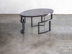 Hammered Windows Ellipse Table with Noir Doré Top and Burnished Hammered Steel