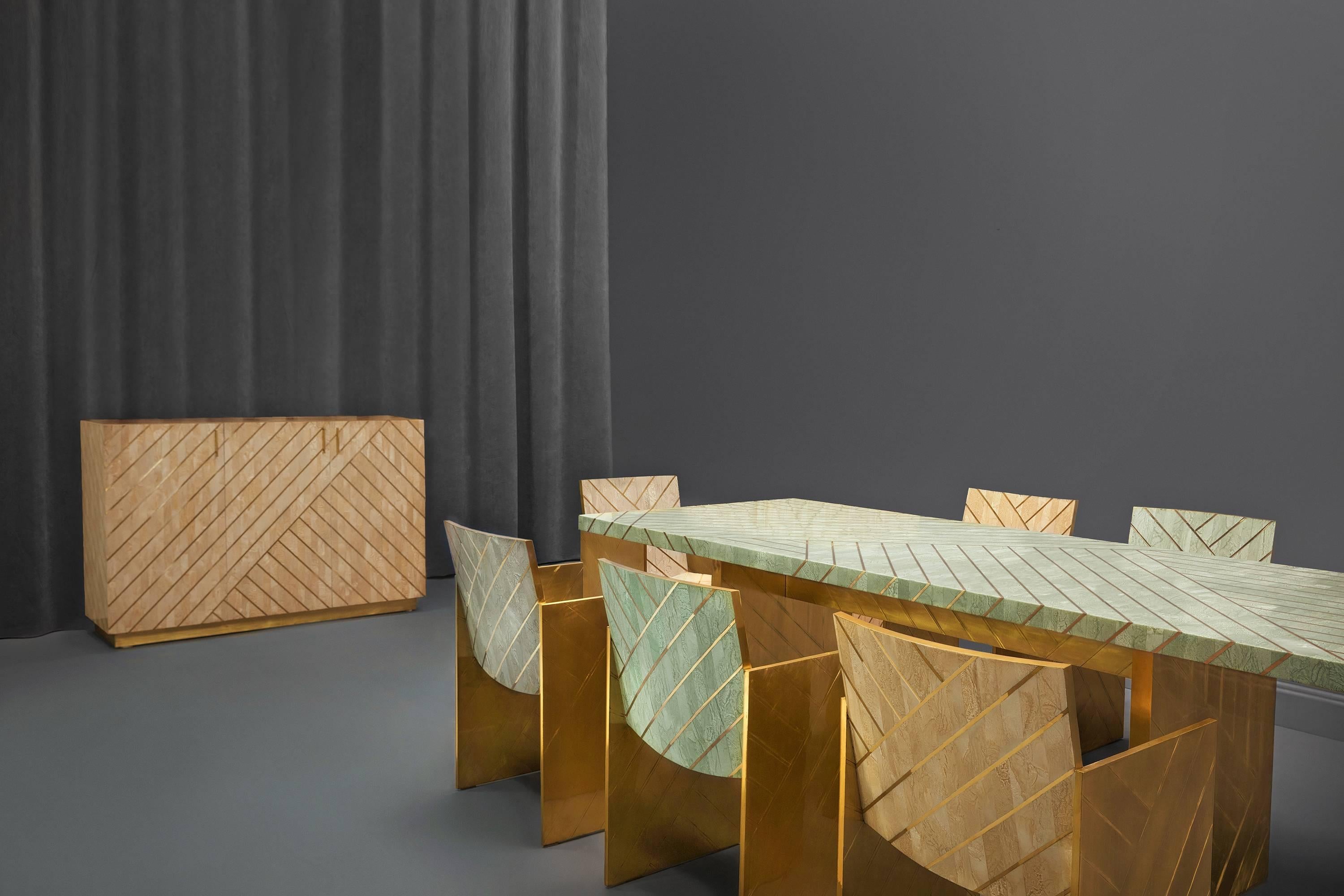 Geometry is truly fascinating, unexpected forms from Matteo Cibic, transgress the monotony of straight lines set in gold on a bed of pearl and lacquered brass in stylish, which hues.

Nesso sideboard beige is a beautiful cabinet in pearly resin