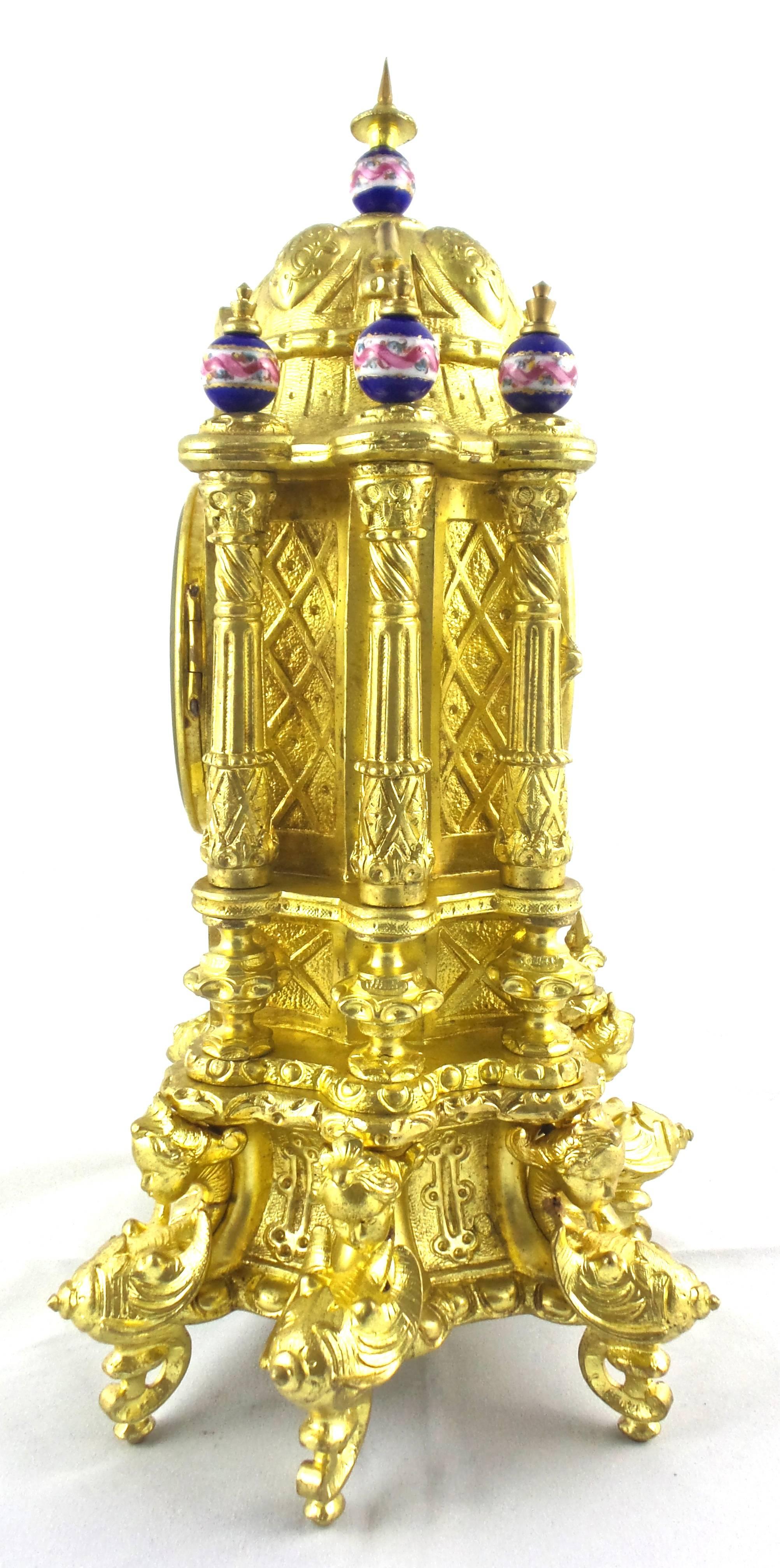 An original authentic antique 19th century French solid gilt ormolu bronze and hand-painted Sevres porcelain mantel clock
Very impressive clock in a rare eastern theme
Having domed top and shaped three pillars each side
There are 3 dimensional