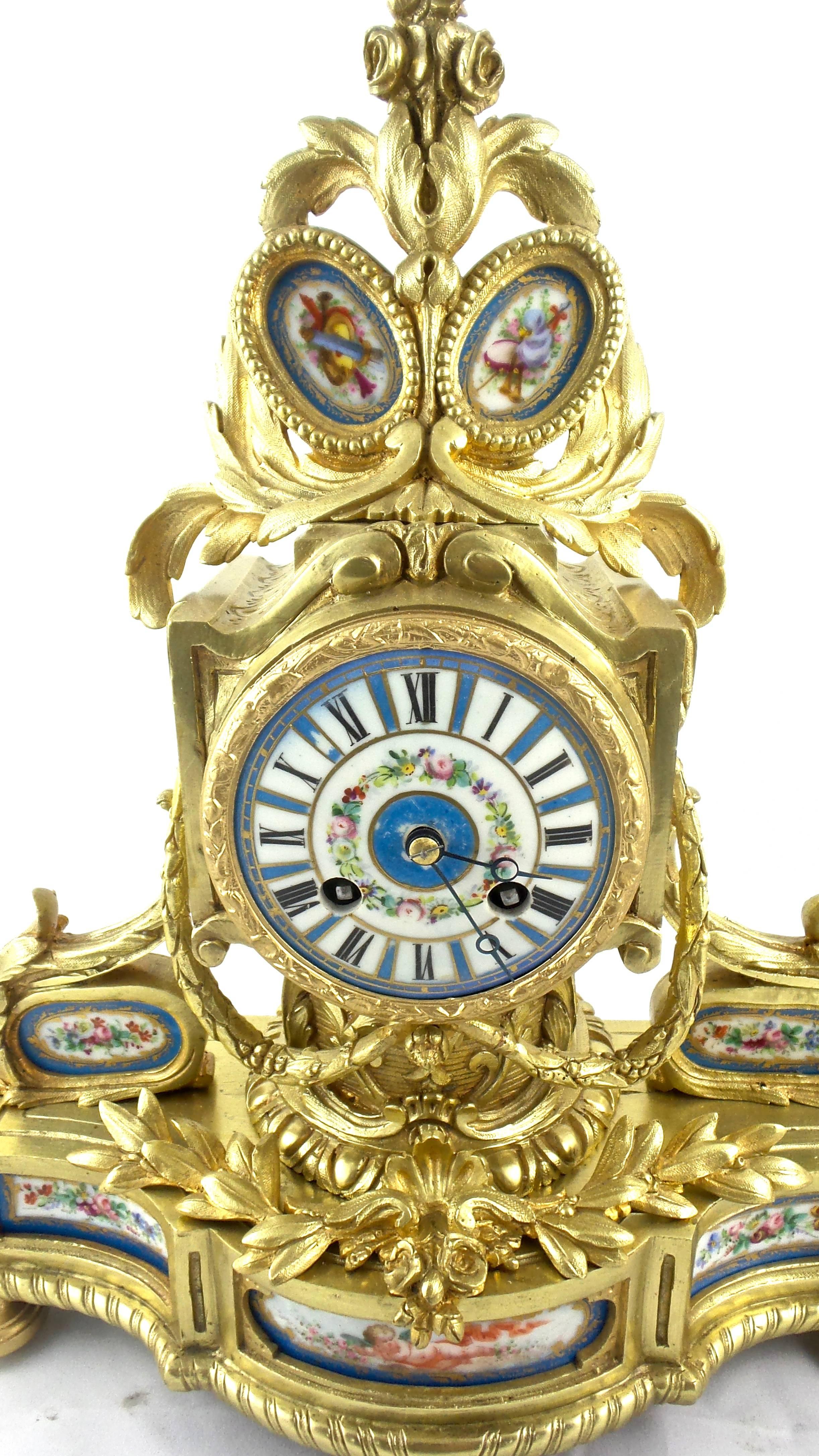 An original authentic antique 19th century French solid gilt brass and hand-painted Sevres porcelain mantel clock
Very impressive clock and very beautifully decorated
Having draped sections and acanthus displays
Hand-painted Sevres porcelain